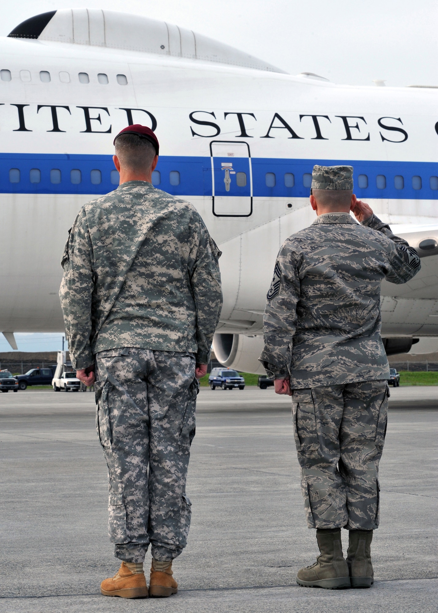 ELMENDORF AIR FORCE BASE, Alaska -- Leadership salute Secretary of Defense Robert M. Gates as he arrives here June 1, 2009. Secretary Gates came to Elmendorf to discuss with Airmen how the war is affecting this base and their everyday lives. (U.S. Air Force/Senior Airman Laura Turner)
