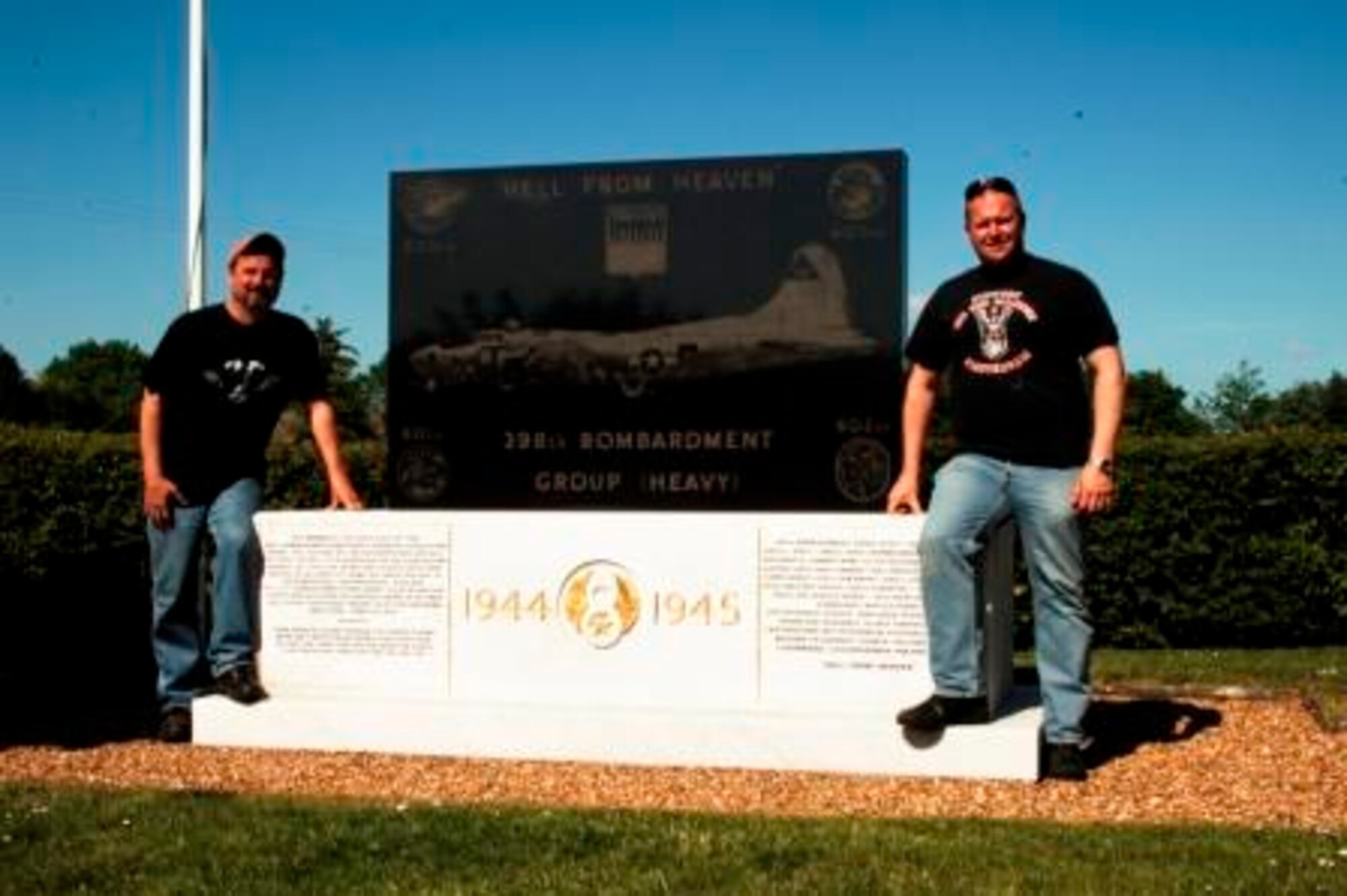 Kevin Fromweiler, JIOCEUR Analytic Center employee, "Harley Mark," and the 398th Bomb Group Memorial, just outside a 17th-century pub at Nuthampstead.  (U.S. Air Force photo by Staff Sgt. Chad E. Chisholm) 
