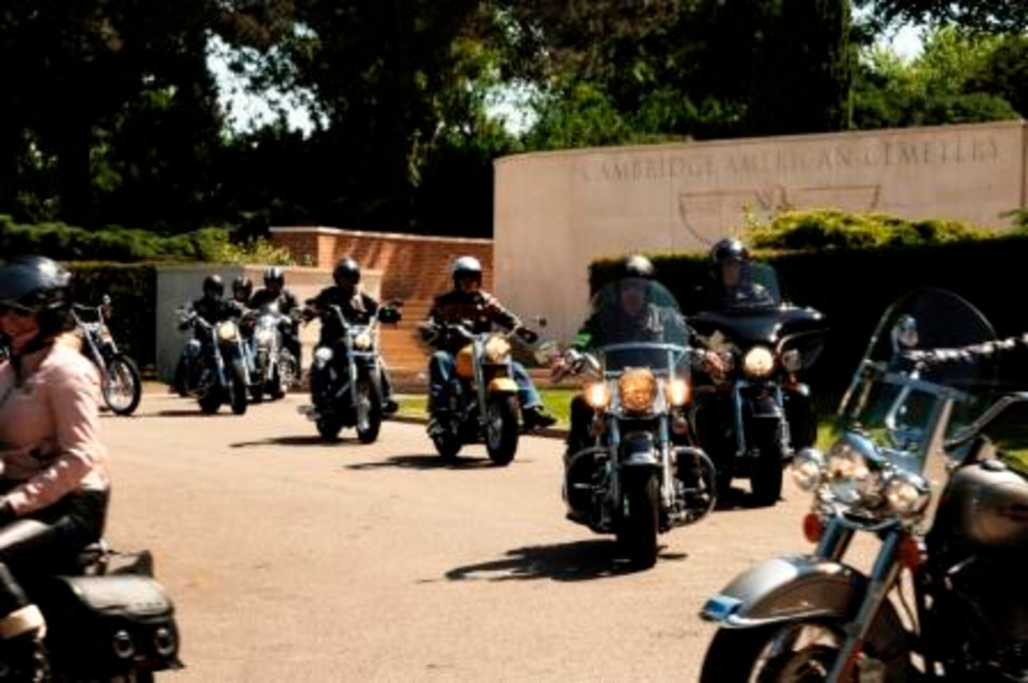 Riders ride into the Cambridge American Cemetery.  (U.S. Air Force photo by Staff Sgt. Chad E. Chisholm) 