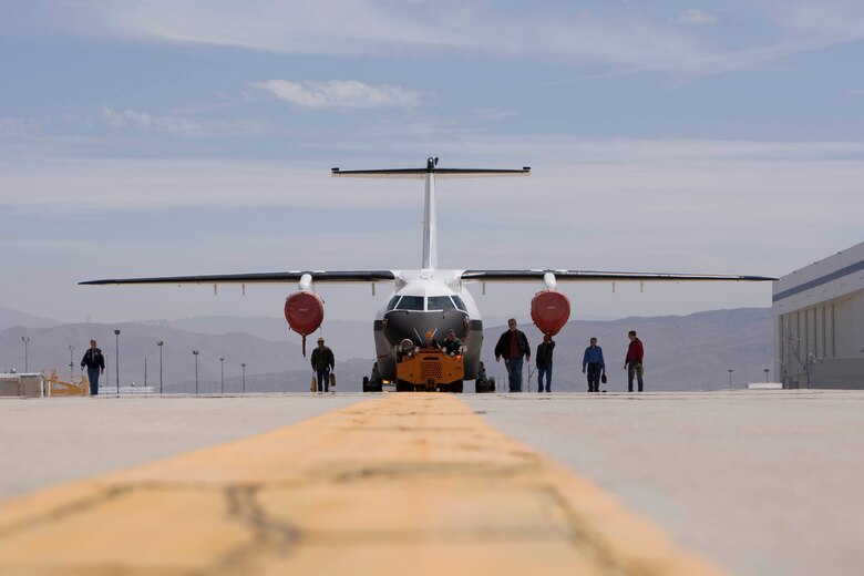 The Advanced Composite Cargo Aircraft is rolled out in May 2009 at Lockheed Martin's Skunk Works, U.S. Air Force Plant 42 in Palmdale, Calif. The ACCA is a modified Dornier 328J aircraft.  The fuselage aft of the crew station and the vertical tail were removed and replaced with completely new structural designs made of advanced composite materials fabricated using out-of-autoclave curing.  Air Force Research Laboratory at Wright-Patterson Air Force Base, Ohio oversees the ACCA program. (Lockheed Martin photo)