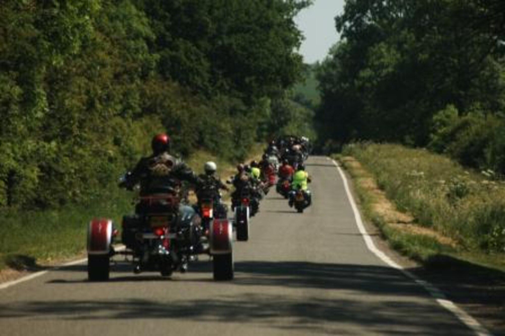 Rolling' down the road: the HOG rides to the next stop of their ride-out.  (U.S. Air Force photo by Staff Sgt. Chad E. Chisholm)