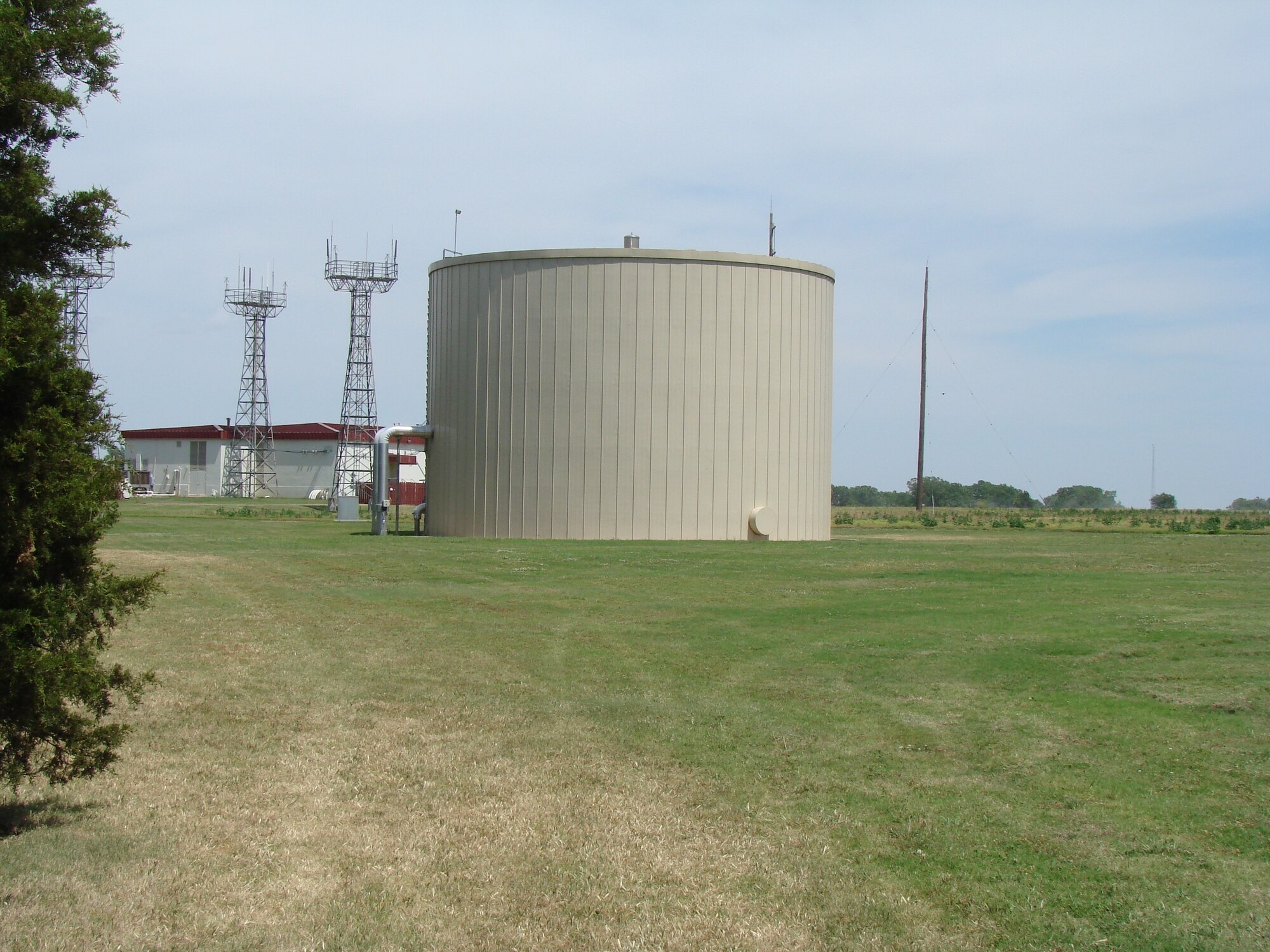 Vance AFB is continuing to find new ways of conserving energy. One simple example is the 610,000 gallon insulated storage tank on base. Water is chilled at night to 35 degrees Fahrenheit and then distributed to several surrounding buildings. This provides a less-expensive cooling method than conventional air cooling systems. 