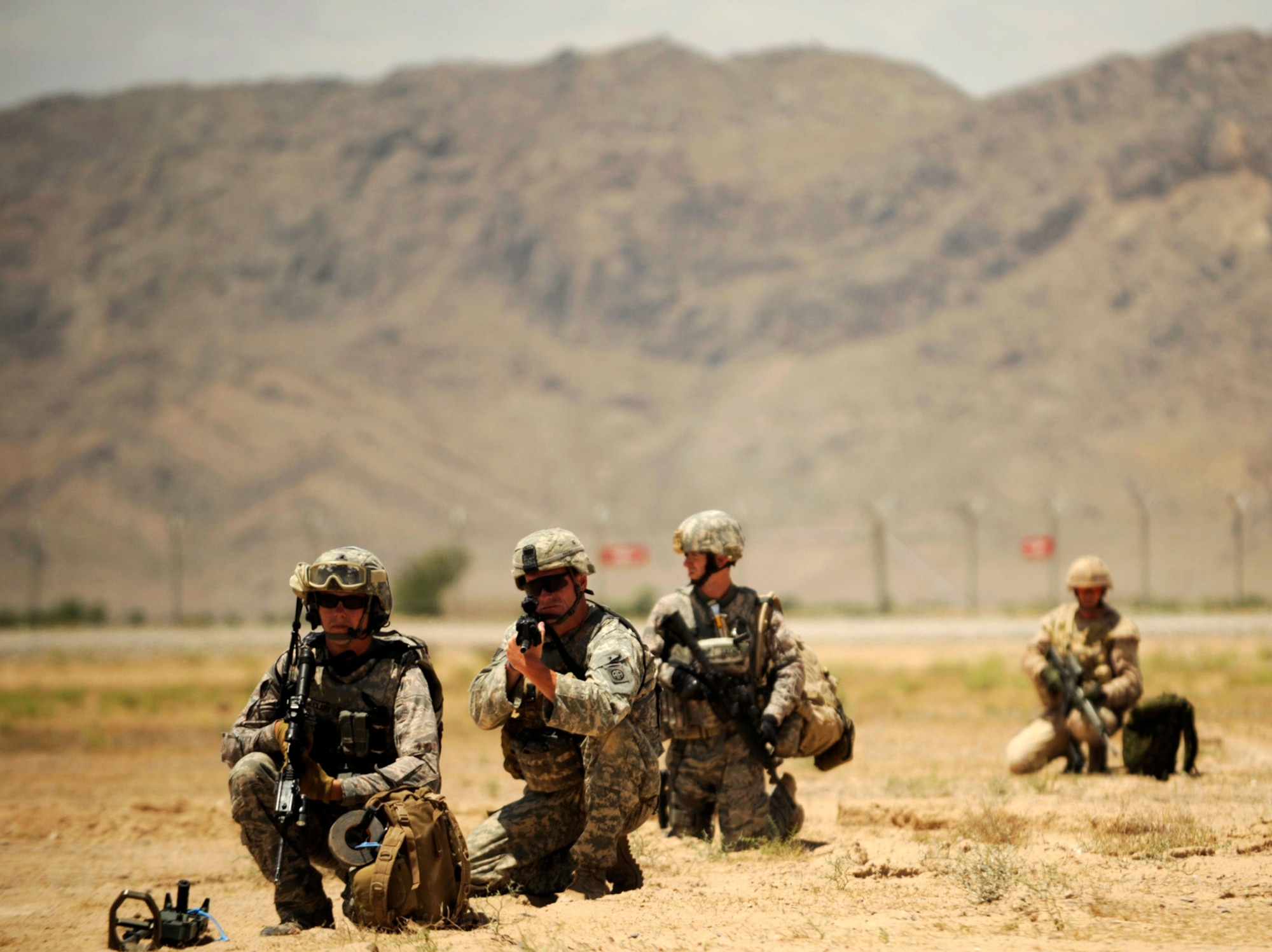 Airmen with the 755th Explosive Ordnance Disposal unit conduct explosive ordnance training with members of the 82nd Airborne May 5 at Kandahar Airfield, Afghanistan. (U.S. Air Force photo/Staff Sgt. James L. Harper Jr.) 
