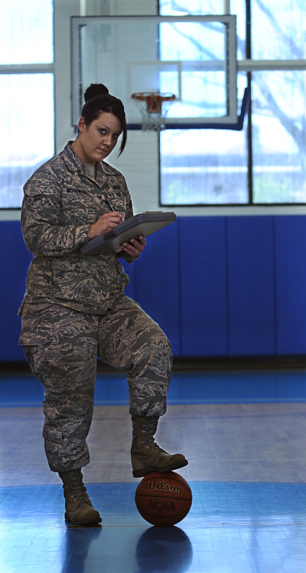 LANGLEY AIR FORCE BASE, Va. -- Airman 1st Class Whitney Woodward, 71st Fighter Squadron aviation resource management, volunteered to coach for the eight to ten-year-old basketball league at the youth center during her free time. (U.S. Air Force photo/Senior Airman Scott Aldridge)