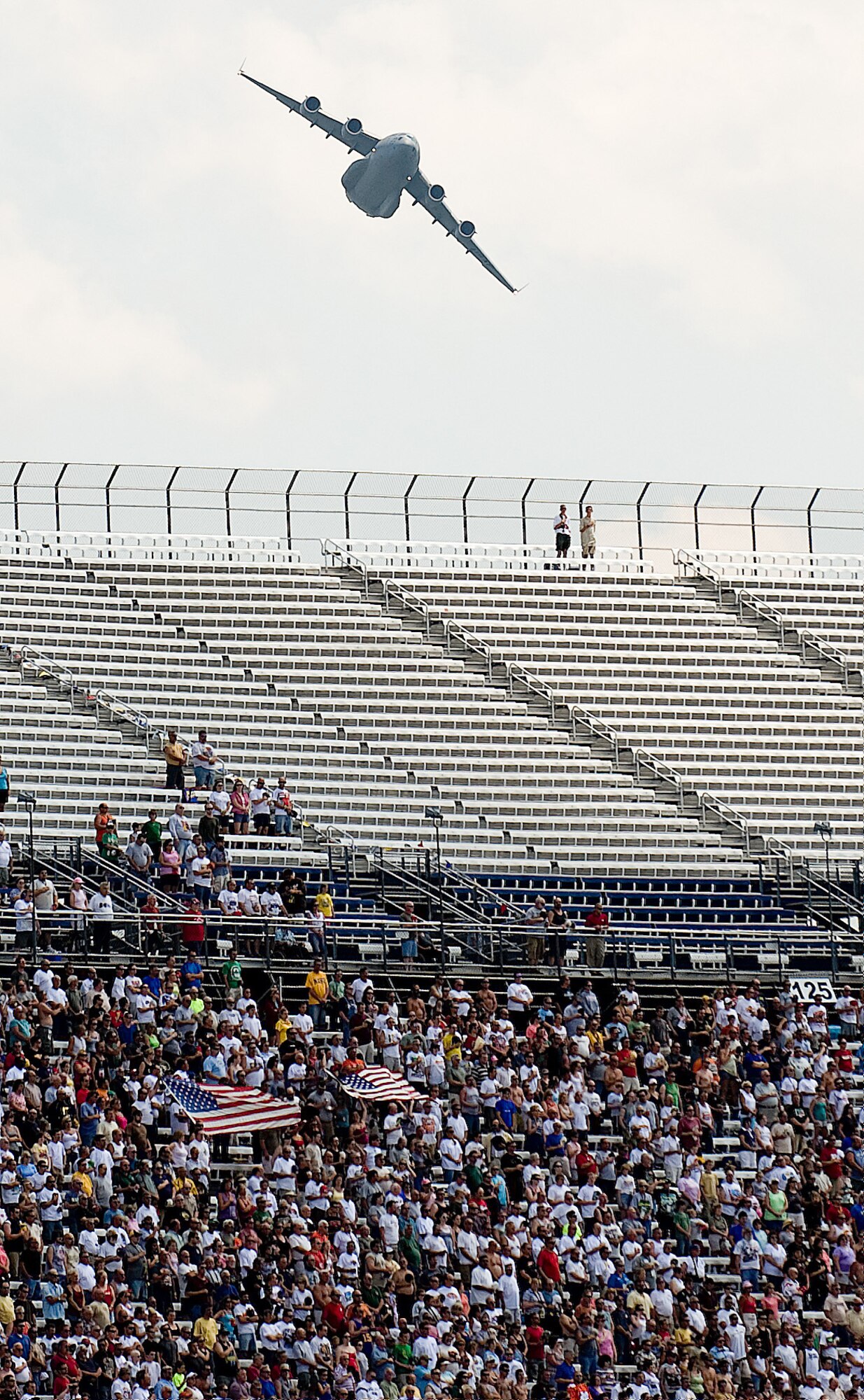 A C-17 Globemaster III from Dover Air Force Base performs a fly over before the Heluva Good! 200 NASCAR race at Dover Downs May 30. (U.S. Air Force photo/Jason Minto)