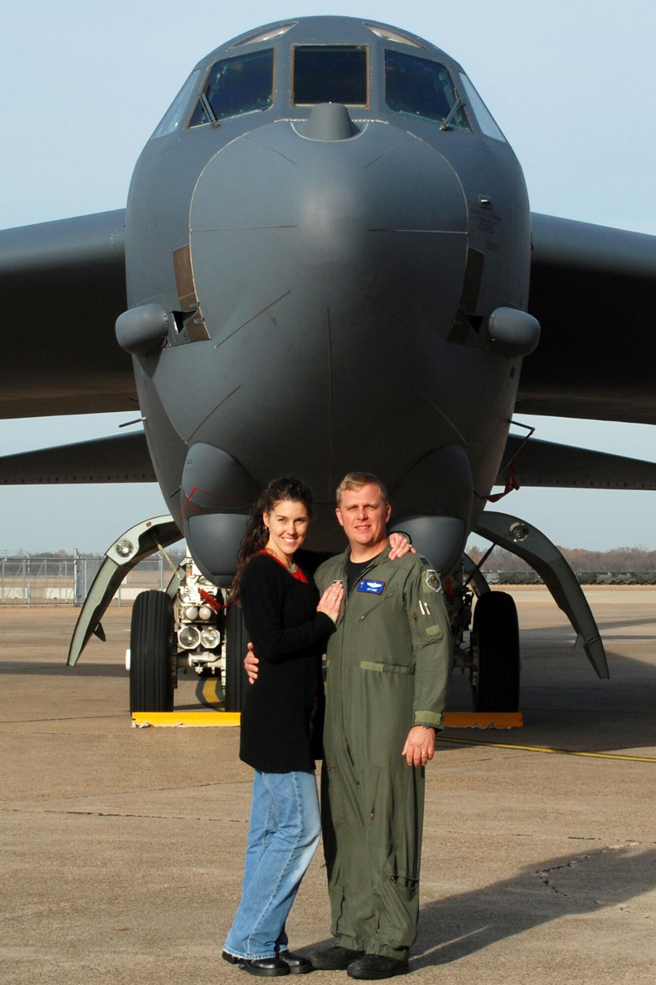 Maj. Maury Kent, 917th Wing Operations Support Flight, wing weapons officer, Barksdale Air Force Base, La., poses in front of a B-52 Stratofortress on the ramp with his wife Cheryl at Barksdale AFB, Dec. 6, 2008. Maj. Kent recently made a move from the 93rd Bomb Squadron to the 47th Fighter Squadron. After training on the A-10 Thunderbolt, Maj. Kent will return the here as a fighter pilot for the 47th FS. (Courtesy photo)