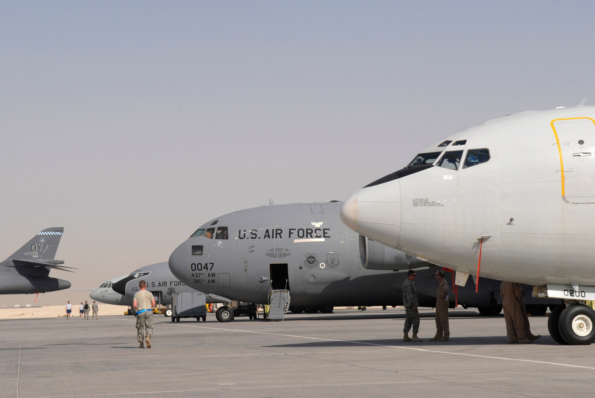 An E-8C Joint Surveillance Target Attack Radar System aircraft heads a line of planes parked at Flightline Fest, 29, 2009, at an undisclosed location in Southwest Asia.  The 379th Air Expeditionary Wing hosted the half day event which gave base personnel the chance to look at static aircraft displays and other equipment up close, all without interrupting the mission of providing combat airpower throughout the U.S. Central Command's area of responsibility.  The other aircraft in line are a C-17 Globemaster III, a KC-135R Stratotanker, a Royal Air Force Vickers VC-10 tanker and the tail of a B-1B Lancer.  The 379th Air Expeditionary Wing operates in support of Operations Iraqi and Enduring Freedom and Combined Joint Task Force-Horn of Africa. (U.S. Air Force photo/Senior Airman Andrew Satran/released)
