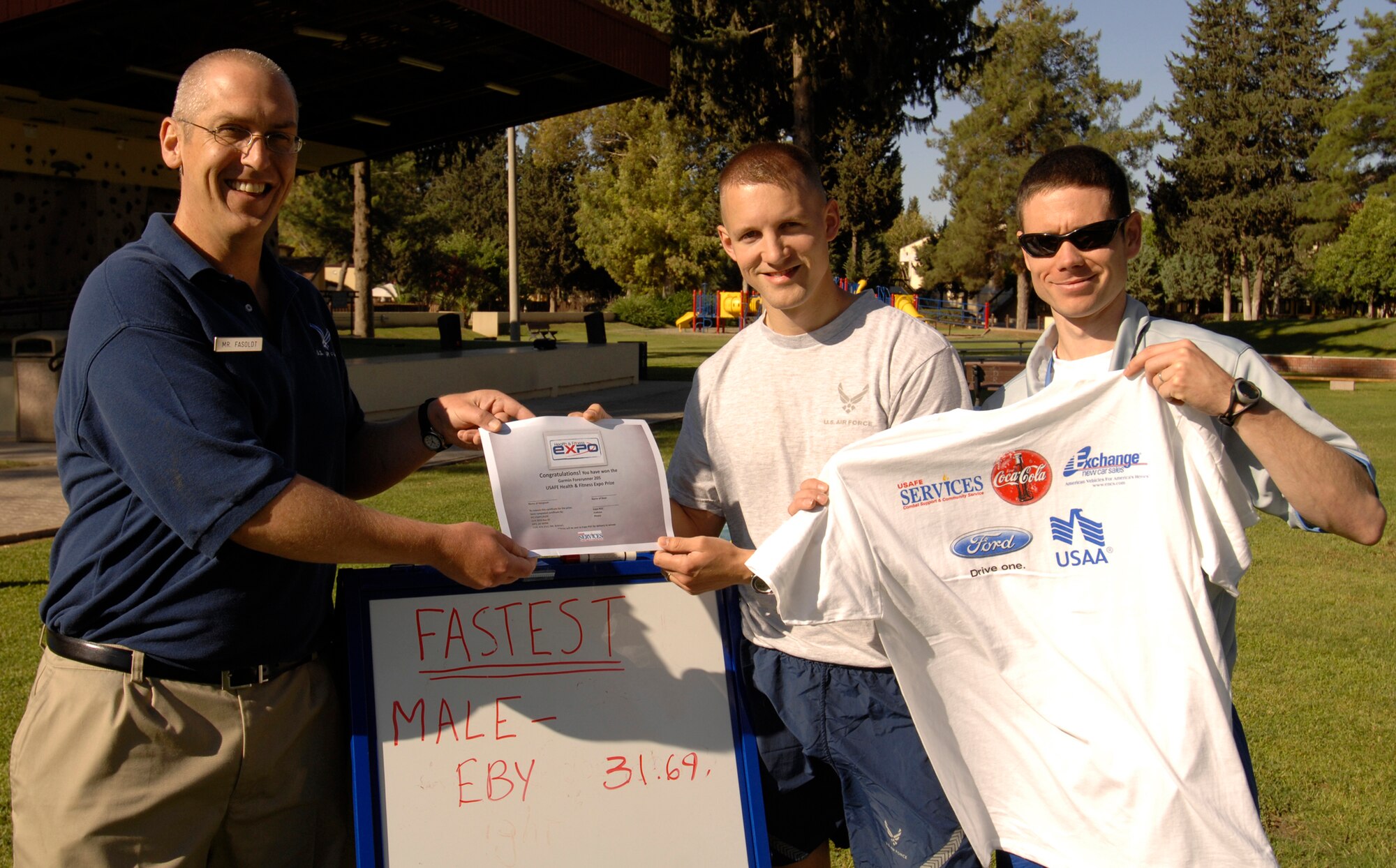 Capt. Lucas Eby, 39th Air Base Wing, accepts a certificate for a GPS during the culmination of the United States Air Forces in Europe Health and Fitness Expo, Friday, May 29, 2009, Incirlik Air Base, Turkey. Captain Eby completed the course the fastest with a time of 31.69 seconds. The expo began after the wing run as part of the wing training day and informed base Airmen about healthy lifestyle choices and base resources for improving their daily routine. (U.S. Air Force photo/Senior Airman Benjamin Wilson)