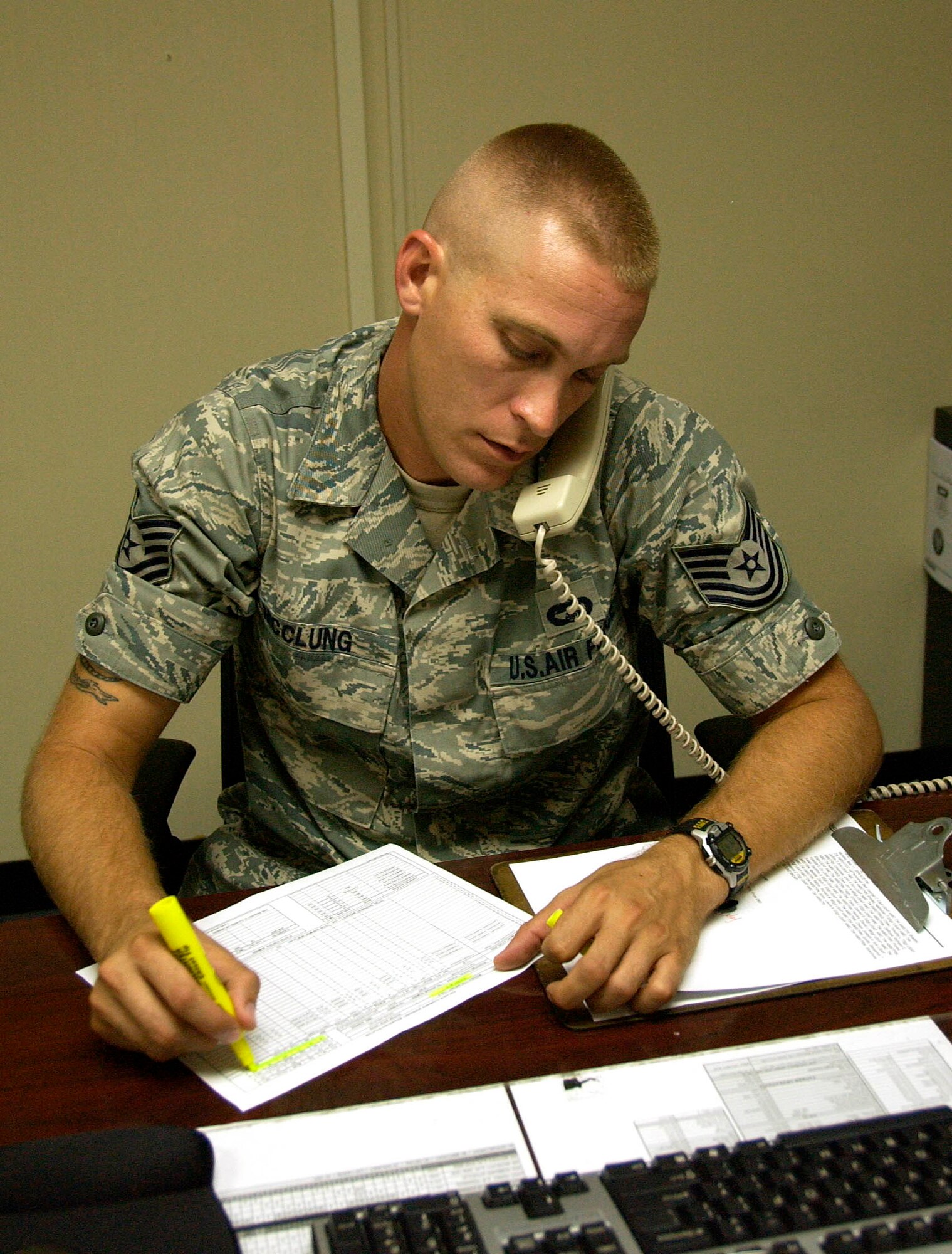 ANDERSEN AIR FORCE BASE, Guam -- Tech. Sgt. Lewis McClung, 734th Air Mobility Squadron noncommissioned officer in charge of air terminal operations center, coordinates the explosive movement of cargo and inspection of that cargo May 12. Sergeant McClung coordinates for aircraft, crew members and cargo. He ensures all inbound and outbound personnel are accommodated while on Andersen, all cargo and passengers are loaded correctly and all aircraft are safe and ready for flight. (U.S. Air Force photo by Airman Carissa Wolff) 