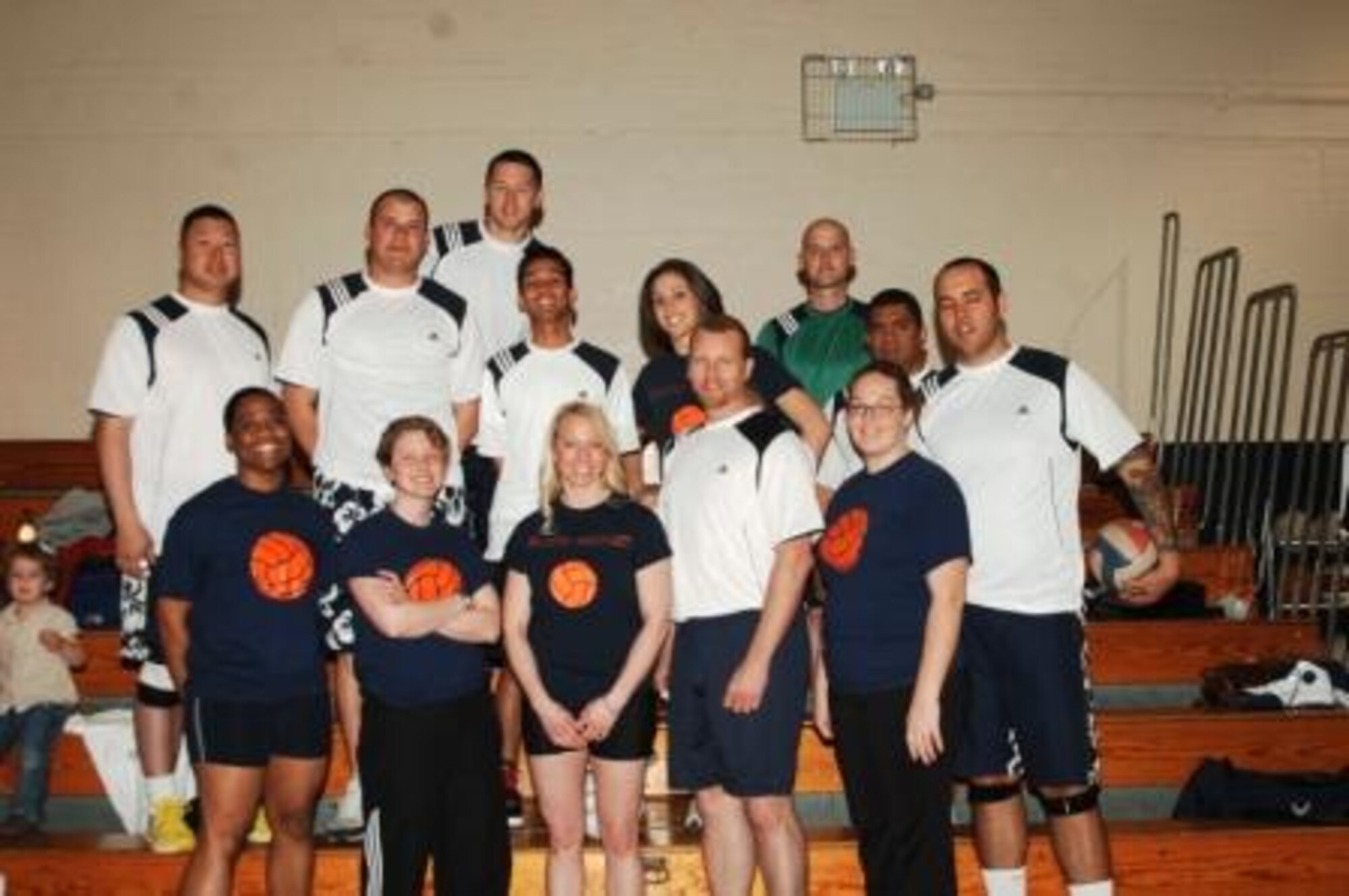Members of the 501st Combat Support Wing men's and women's volleyball teams take a breather between games. The United States Air Forces in Europe Volleyball Championships were held at RAF Alconbury May 20-25. 