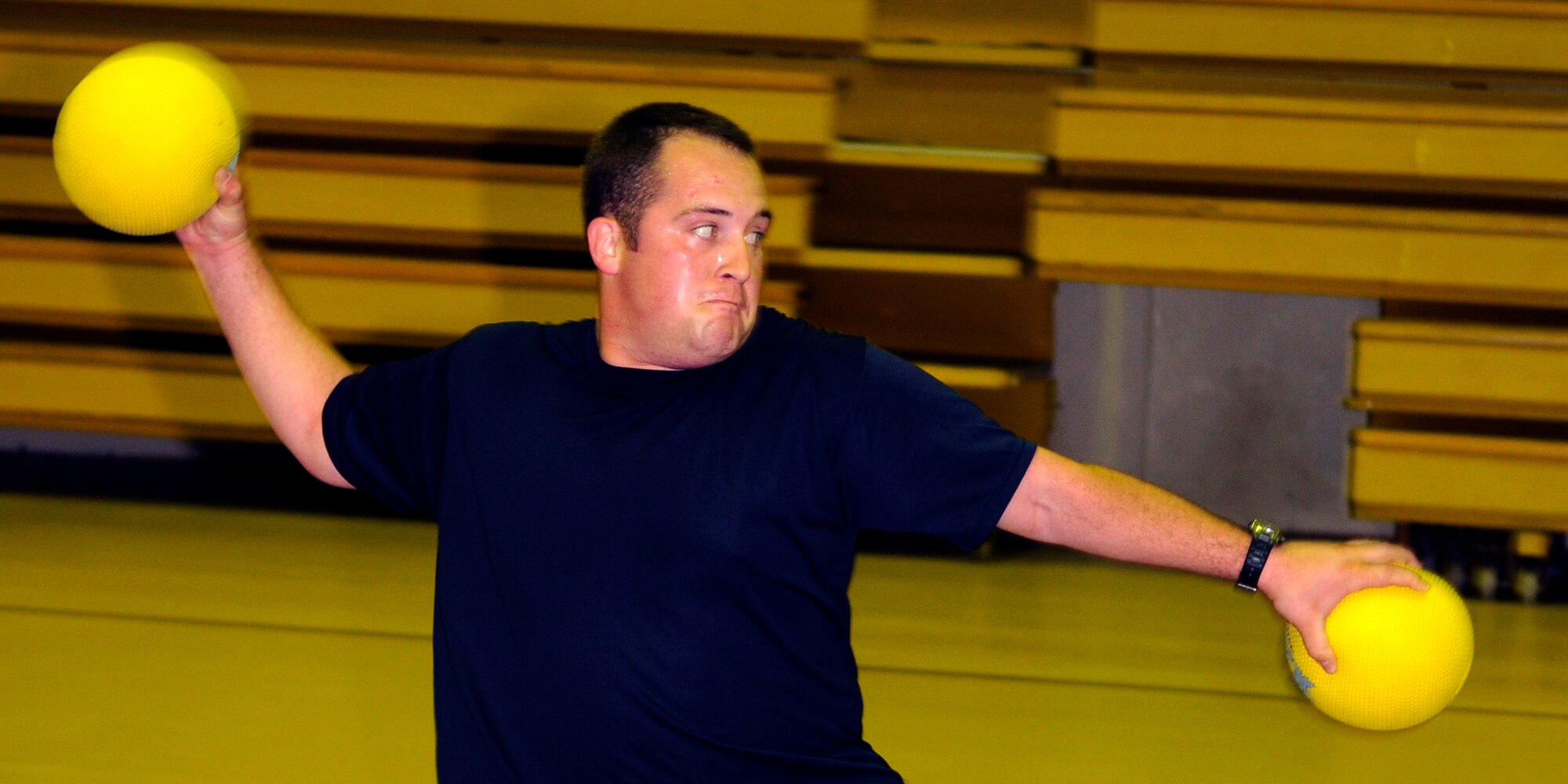 Jessie Salazar, 90th Expeditionary Air Refueling Squadron, takes aim at members of the team representing the 39th Medical Operations Squadron during late-night dodgeball May 29, 2009, at the Incirlik Fitness Center.  The two teams were the only to show up for the event in which the 39th MDOS won the first seven matches.  However, the 817th EARS came back to win the next four before the teams called it quits.  (U.S. Air Force photo/Staff Sgt. Raymond Hoy)