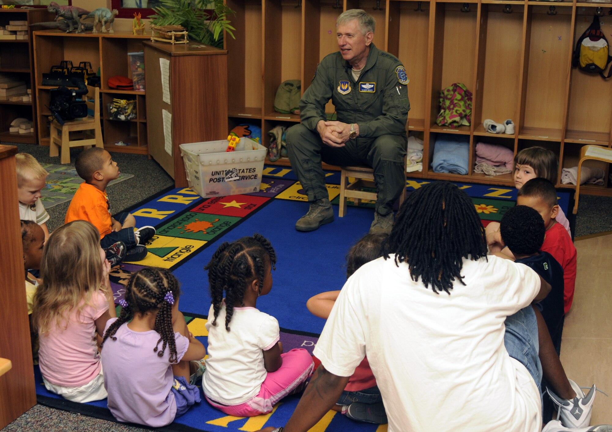 Gen. Roger Brady, United States Air Forces in Europe commander, speaks to children from Incirlik’s child development center while filming an American Forces Network commercial May 20, 2009 at Incirlik Air Base, Turkey. General Brady visited Incirlik to speak with leadership and visit with Airmen. He also toured the base, getting a firsthand view of Incirlik’s squadrons and facilities.  (U.S. Air Force photo/Airman 1st Class Amber Russell)