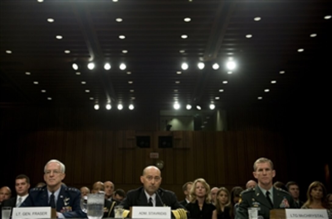 Commander, U.S. Southern Command Adm. James Stavridis (center), U.S. Navy, Deputy Commander, U.S. Pacific Command Lt. Gen. Douglas M. Fraser, U.S. Air Force, and Director, Joint Staff Gen. Stanley McCrystal (right), U.S. Army, testify to the Senate Armed Services Committee on their nominations to lead U.S. European Command, U.S. Southern Command and U.S. Forces Afghanistan in the Hart Senate Office Building, Washington, D.C., on June 2, 2009.  