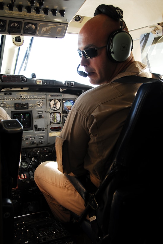 Capt. Daniel Groeling, a UC-12B pilot from the Marine Corps Air Station in Yuma, Ariz., flies to Salt Lake City to drop off a passenger June 2, 2009.(Photo by Cpl. Laura A. Mapes)