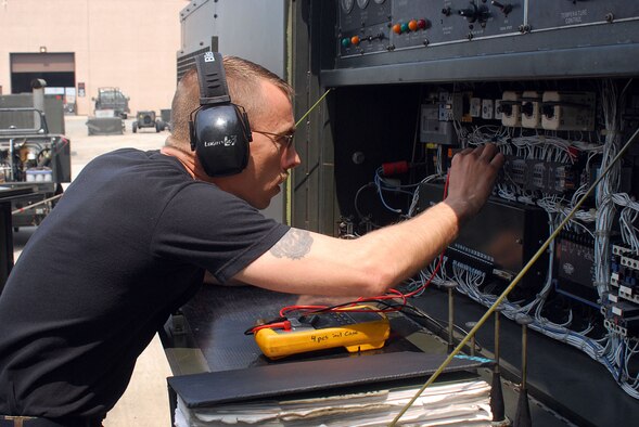 Tech. Sgt. Heath Warren trouble shoots an MA3D air conditioner at the 51st Aereospace Ground Equipment area May 13 at Osan AB, Republic of Korea. The MA3d air conditioner is used is used to cool the avionics sections of aircraft here. Sergeant Warren is a member of the 51st Maintenance Squadron. (U.S. Air Force photo/Staff Sgt. Terri Barriere)