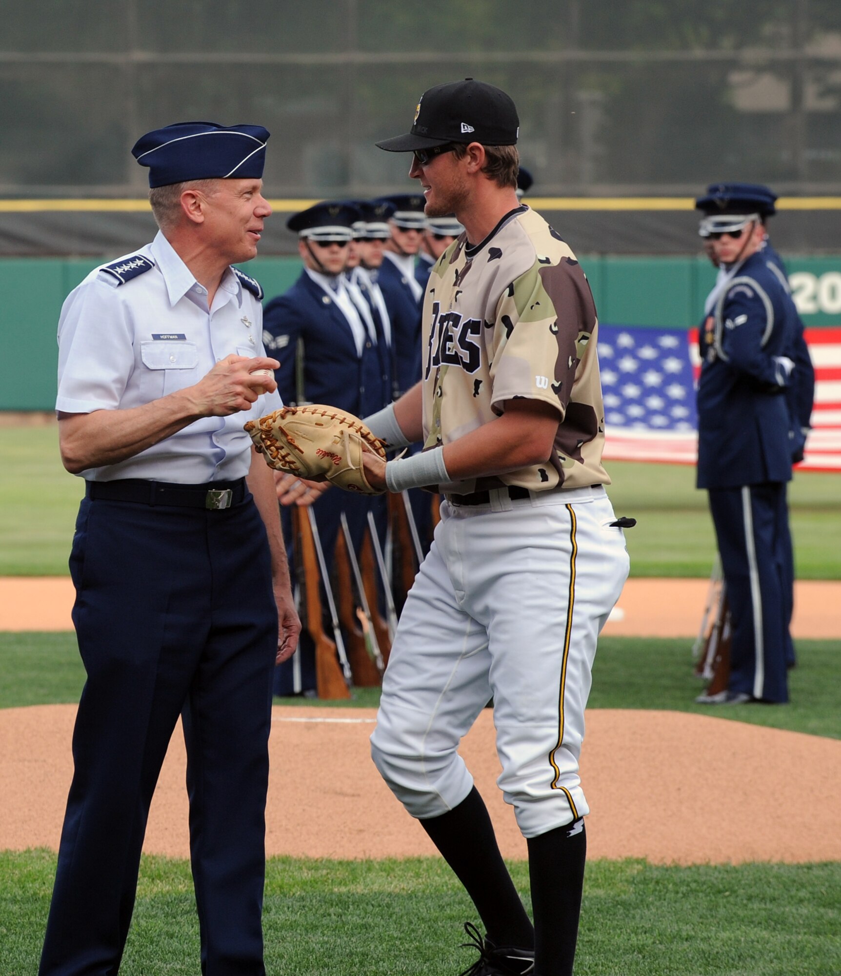 Adam Pavkovich, Salt Lake Bees Infielder, hands over the game ball to
General Donald Hoffman, Air Force Materiel Command Commander, after catching
it from him for the ceremonial first pitch at the Airman's Opener baseball
game held at Spring Mobile Ballpark during Air Force Week Salt Lake City on
June 1, 2009. (U.S. Air Force photo by Alex R. Lloyd)
