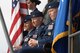 Col. Mark Dillon, (left), 60th Air Mobility Wing commander, Col. Jim Baron, (center), outgoing 60th Operations Group commander and Col. Anthony Butters, incoming 60th OG commander, sit during the 60th OG change of command June 1 on the flightline. Col. Anthony Butters assumed command from Col. Jim Baron during the ceremony. (U.S. Air Force photo/Nan Wylie)