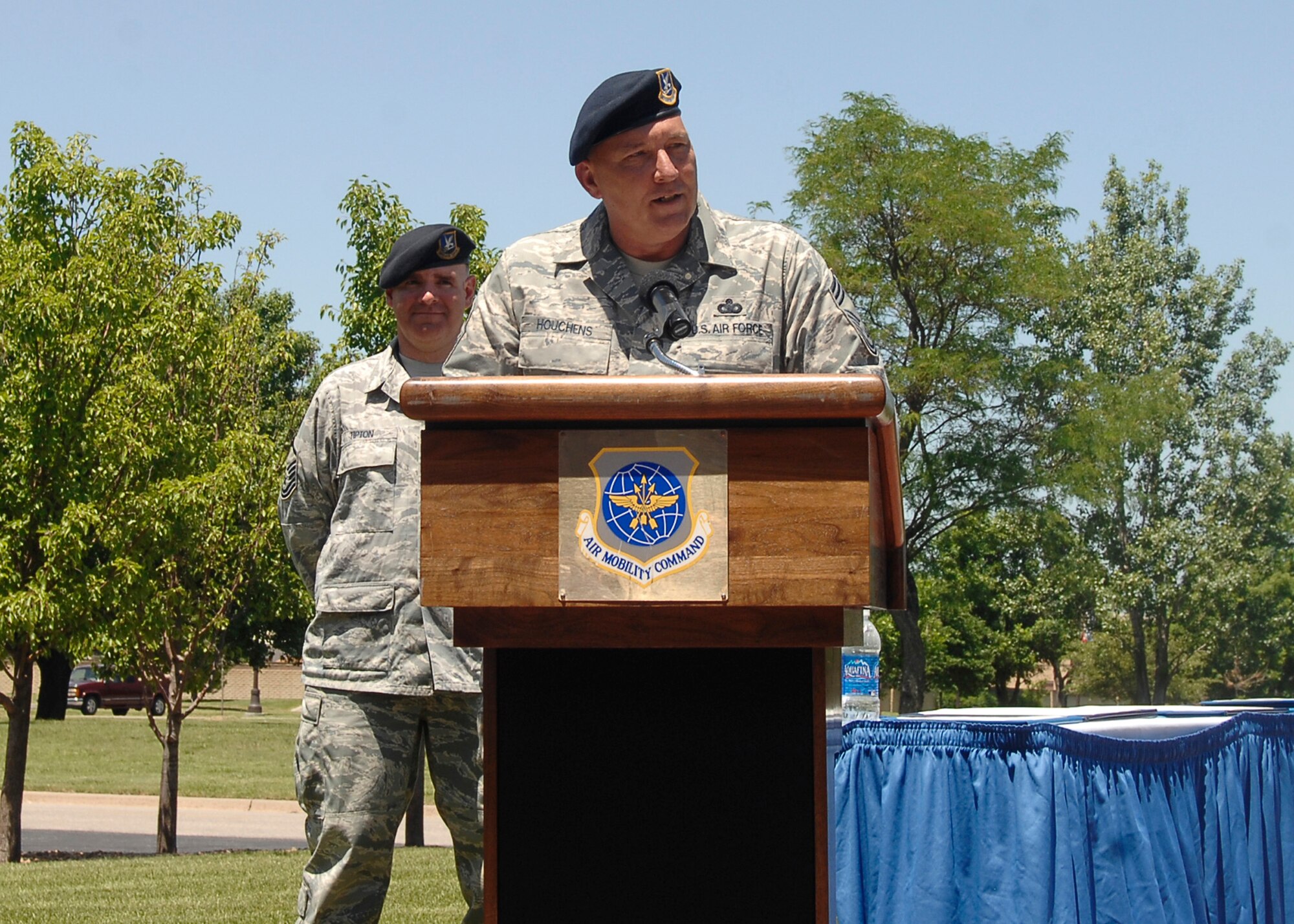 MCCONNELL AIR FORCE BASE, Kan. -- Chief Master Sgt. Alan Houchens, 22nd Security Forces Squadron superintendent, talks about during his retirement ceremony outside of the wing head quarters building, May 29.  Chief Houchens served 30 years and four days in the Air Force. (Photo by Senior Airman Anthony Mejia)