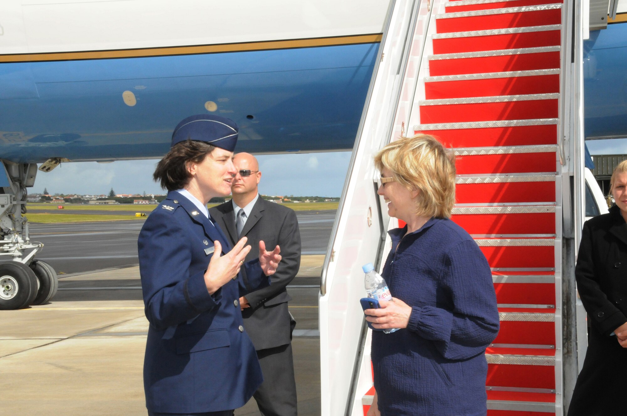 65th Air Base Wing Commander, Col. Peggy Poore, greets Secretary of State Hillary Rodham Clinton during a stop at Lajes Field, Azores, Portugal on June 3.  Secretary Clinton stopped here en route to Cairo, Egypt to join President Barack Obama for his speech, and participate in the President's meeting with President Hosni Mubarak. (U.S. Air Force photo by Tech Sgt. Rebecca F. Corey)