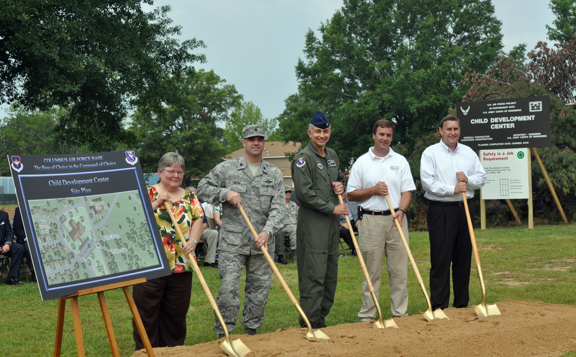 Col. Roger Watkins, 14th Flying Training Wing commander (center), joins Martha Mann, Child Development Center director; Lt. Col. Mike Dilda, 14th Mission Support Group Deputy commander; and Justin Murphy, Columbus Resident Engineer, Mobile District, U.S. Army Corps of Engineers and Ben Logan, President of Carothers Construction, in breaking ground on the new CDC June 3. The $6.5 million, 24,400 foot facility will replace the current, under-sized child care facility. (U.S. Air Force photo/Senior Airman Jacob Corbin). 