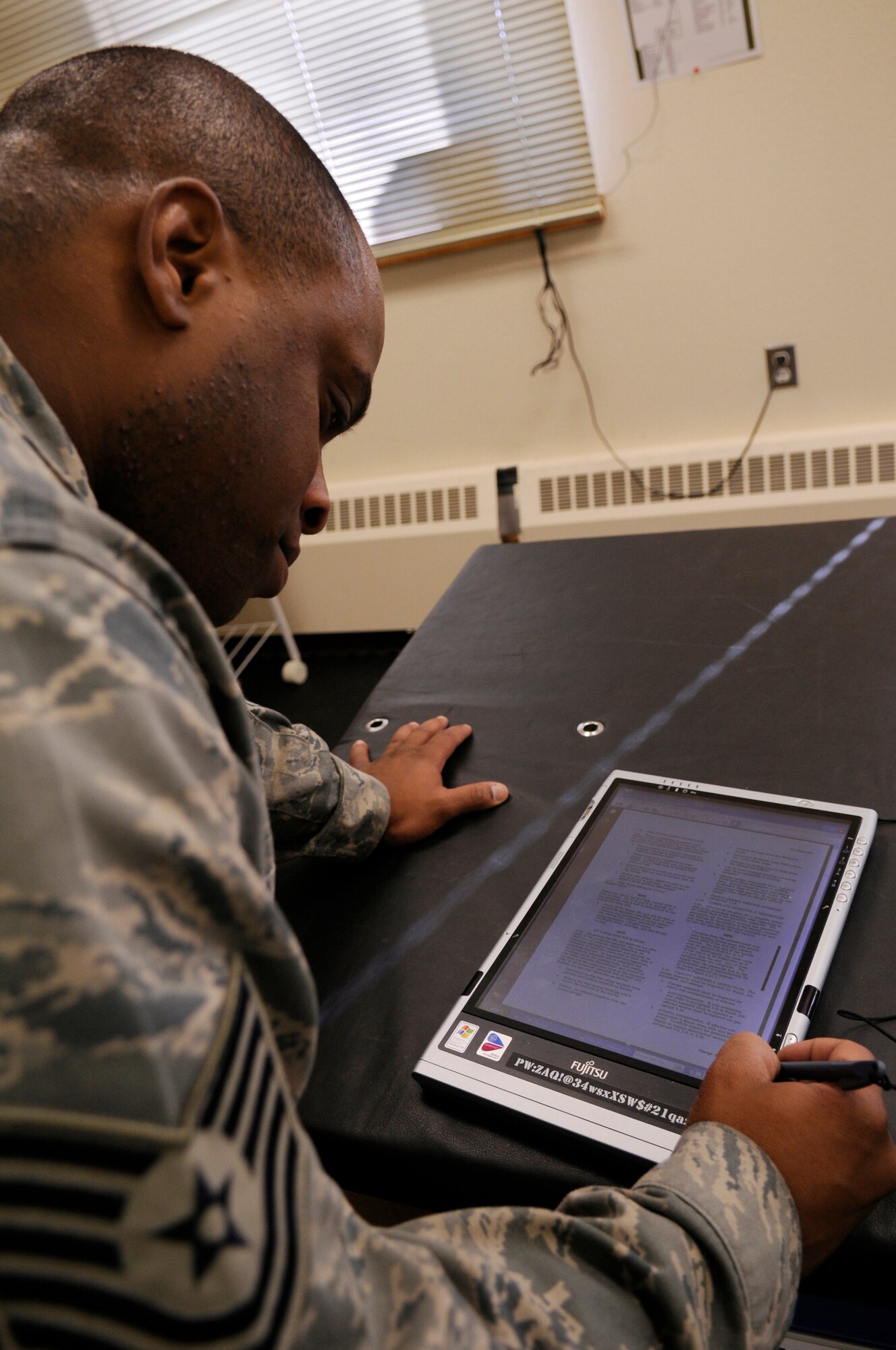Tech. Sgt. Crosby Newbill reviews a parachute packing checklist May 26, 2009, Eielson Air Force Base, Alaska. Life support staff ensure the pilots equipment is in working condition prior to them stepping. Sergeant Newbill is an aircrew flight equipment NCOIC with the 354th Operations Support Squadron. (U.S. Air Force photo/Airman 1st Class Laura Max)