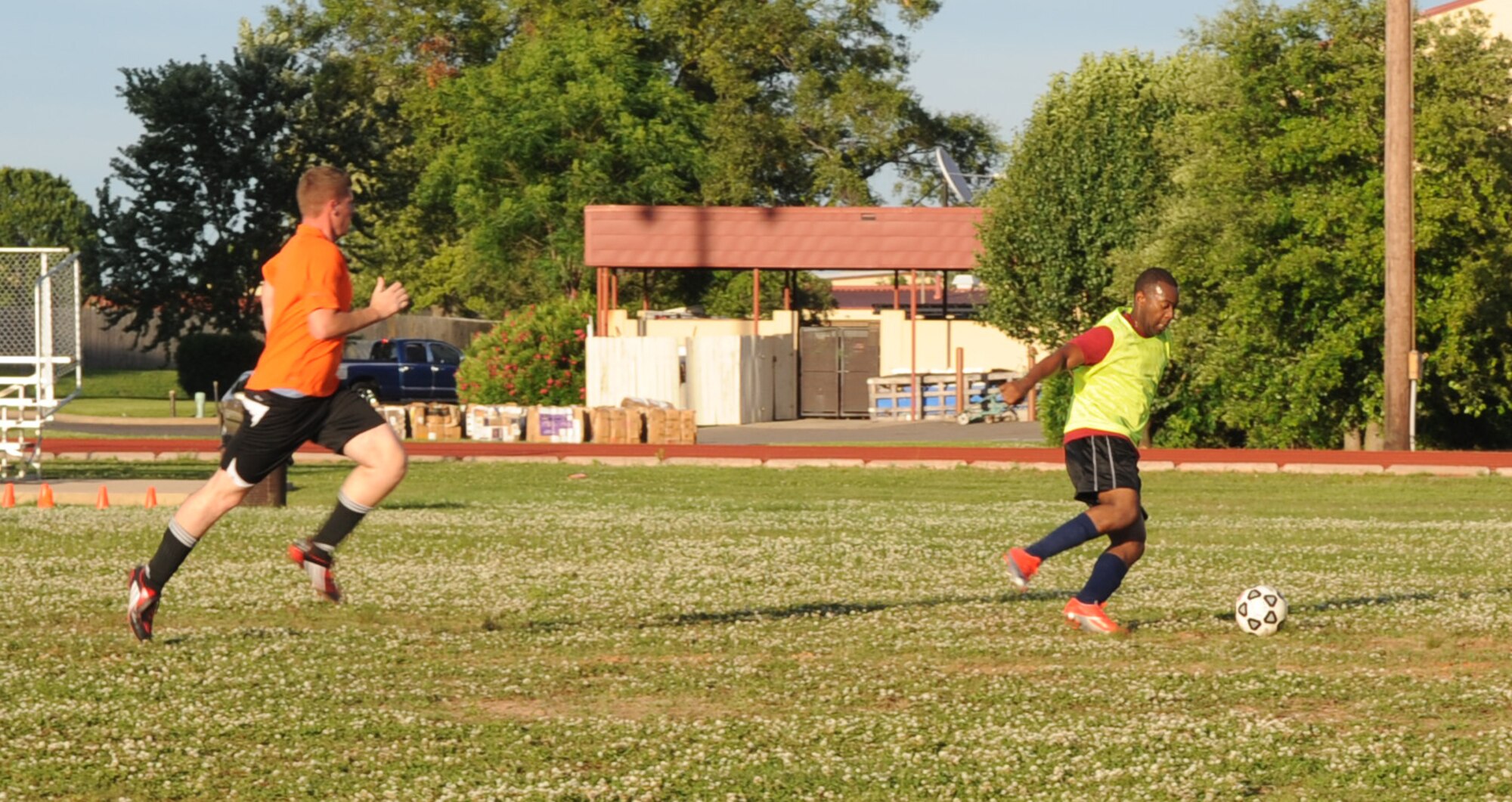 Zebulan Williams, 2d Munitions Squadron sprints towards the opposing team, 2d Logistics Squadron during a soccer game held at the Barksdale Fitness Center field, May 27.  (United States Air Force photo by Senior Airman Alexandra Sandoval) (RELEASED)