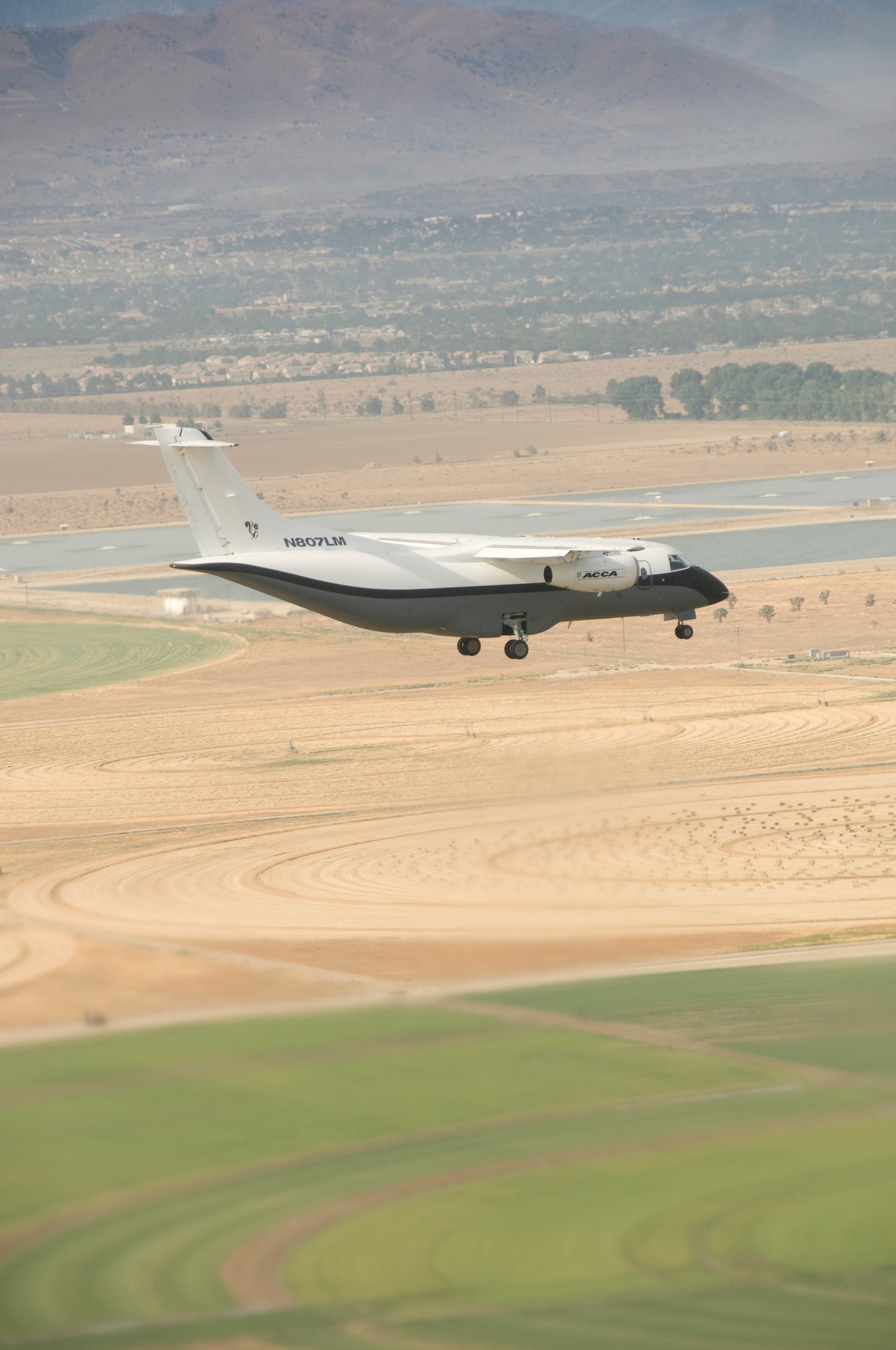 The Advanced Composite Cargo Aircraft made its first test flight June 2 from Air Force Plant 42 in Palmdale, Calif.  The ACCA is proof of concept technology demonstrator for advanced composite manufacturing processes in a full-scale, certified aircraft. It was developed by the Air Force Research Laboratory and Lockheed Martin. (NASA Dryden Flight Research Center photo/Carla Thomas).