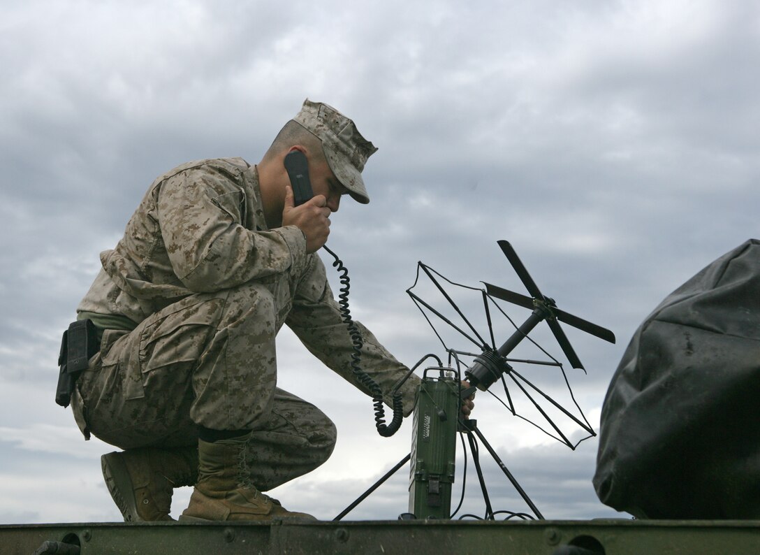 Col. Clyde M. Woltman, former chapter commanding officer and outgoing Marine Aircraft Group 13 commanding officer, speaks to members of Yuma’s Marine Corps Aviation Association’s Tom Miller Squadron at the Sonoran Pueblo at the Marine Corps Air Station in Yuma, Ariz., June 3, 2009. Prior to the change of command, Woltman unveiled a display dedicated to the late Lt. Gen. Thomas H. Miller Jr., the first American to pilot the AV-8A Harrier, for whom the squadron is named.(Photo by Cpl. Laura A. Mapes)