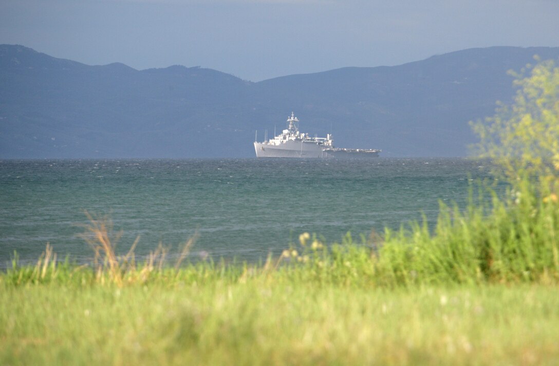 ::n::USS Ponce, part of the Bataan Amphibious Ready Group, sails off the coast of Nea Anchialos Air Force Base in Greece June 3, 2009. Elements of the 22nd Marine Expeditionary Unit went ashore in Greece for a 12-day training evolution. The 22nd MEU is deployed aboard the ships of the BAT ARG and is currently serving as the theater reserve force for U.S. European Command.::n::(Official Marine Corps photo by Cpl. Theodore W. Ritchie)::n::