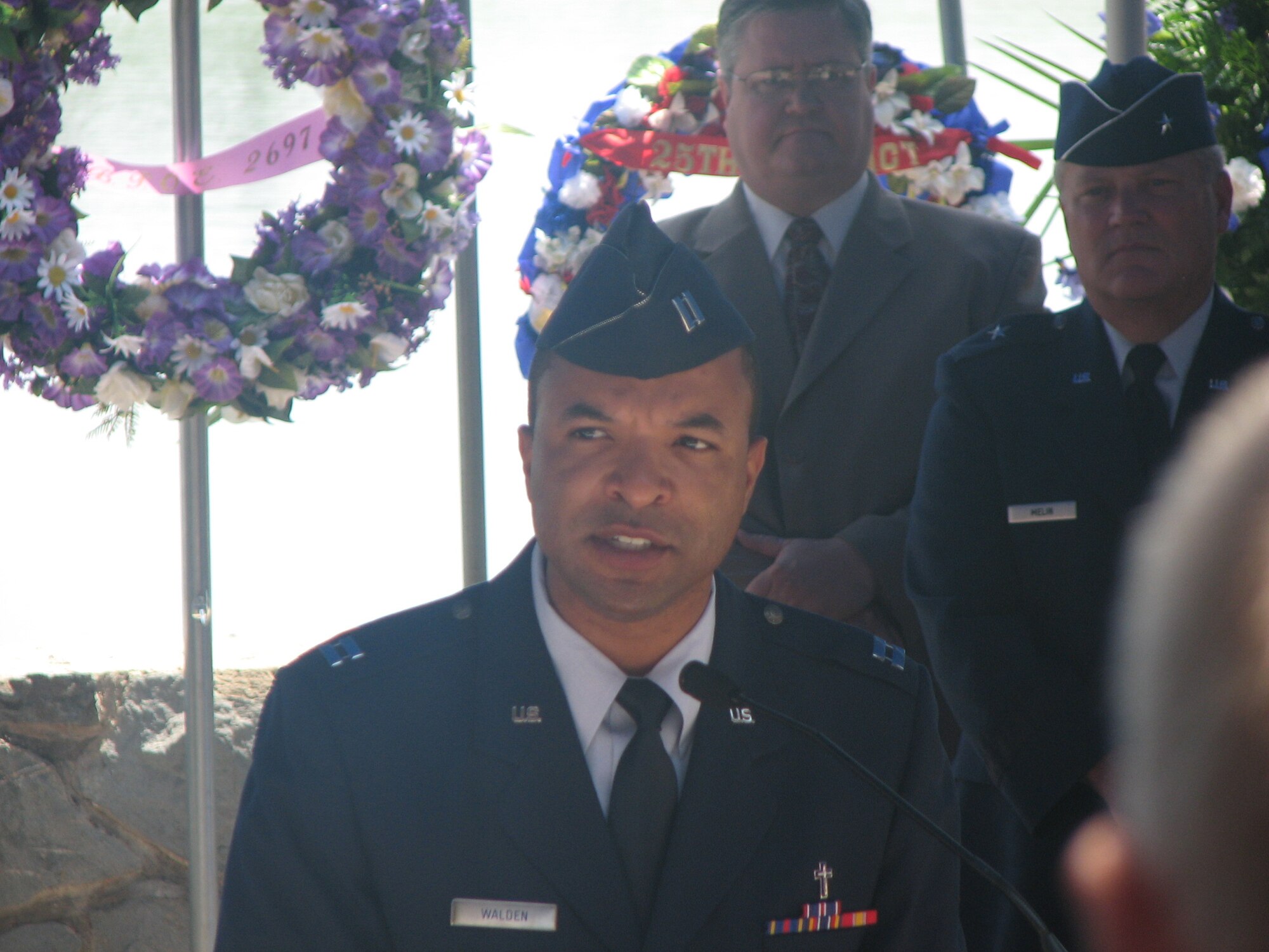 Chaplain Ken Walden, 452 AMW, offers the invocation during the Memorial Day ceremony at the Riverside National Cemetery. Some 10,000 people were present for the event. March provided a C-17 fly over, honor guard and an Airman to read the Airman’s Creed. The California Army National Guard supplied a rifle and canon salute and the UC-Riverside  Bagpipe Band played Amazing Grace. (U.S. Air Force photos by Mrs. Walden)