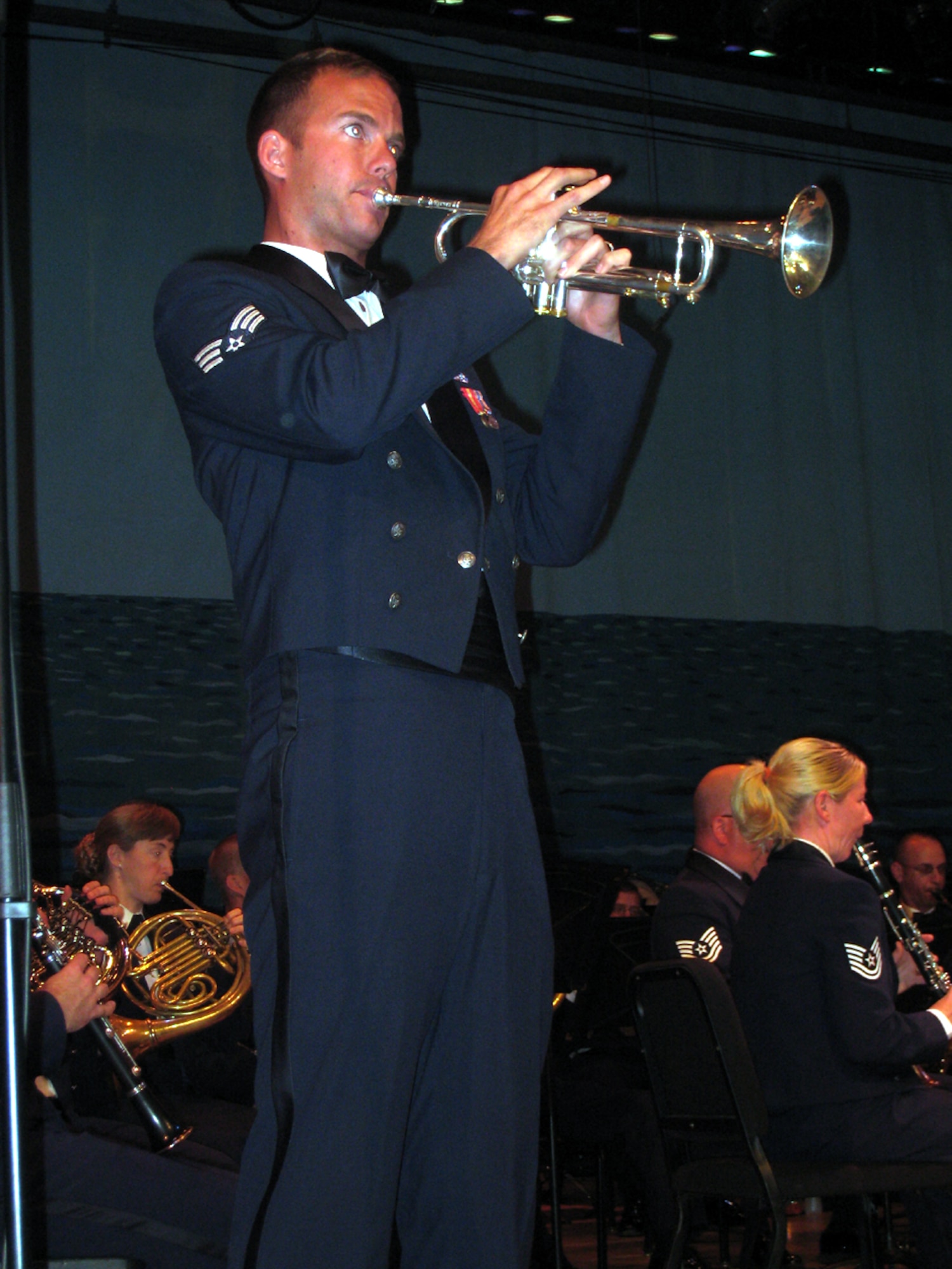 Senior Airman James Lantz, a member of the United States Air Force Band of the Golden West, performs a trumpet solo during a concert at Ramona High School in Riverside, CA.  (U.S. Air Force photo/2nd Lt. Zach Anderson)