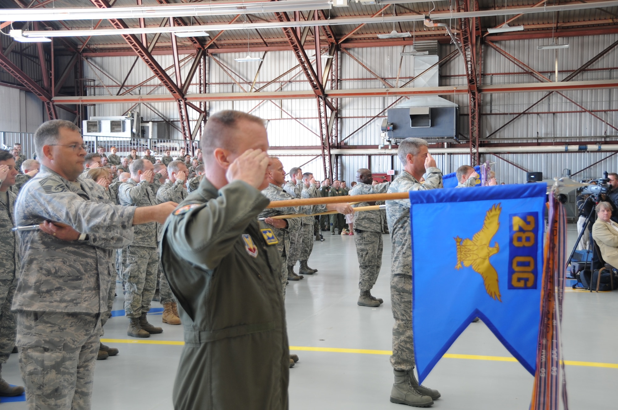 Commanders Col. Buck Shawhan, 28th Operations Group; Col. Thomas Fitch, 28th Maintenance Group; Col. Michael Yuill, 28th Mission Support Group; and Col. Naomi Boss, 28th Medical Group, lead formations in saluting the new 28th Bomb Wing commander, Col. Jeffrey Taliaferro, here, June 04.  Lt. Gen. Norman Seip, 12th Air Force commander, officiated the change of command ceremony. (U.S. Air Force photo/Senior Airman Anthony Sanchelli)

