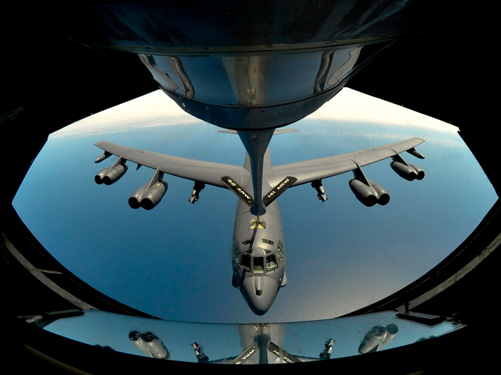 FAIRCHILD AIR FORCE BASE, Wash. – A B-52 air craft receives fuel from a KC-135 Stratotanker over California during an Honorary Commanders flight on May 29. The Honorary Commanders aboard the tanker were able to watch the refueling by lying down inside the boom. (U.S. Air Force photo / Airman 1st Class Melissa L. Carlino)  