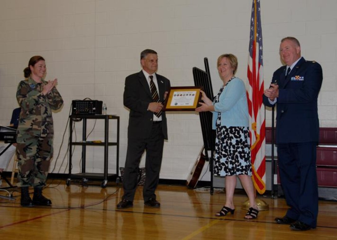 Staff Sgt Karla Belliveau, Mr. Earl Bonett (Western MA ESGR Chair), and Maj. Steve Dougherty (104 FW Civil Engineering Commander), present Ms. Sue Frederick and Mr. Richard Bedard the ESGR recognition awards during the school’s Memorial Day ceremony. (photos by Capt. Matthew T. Mutti)
