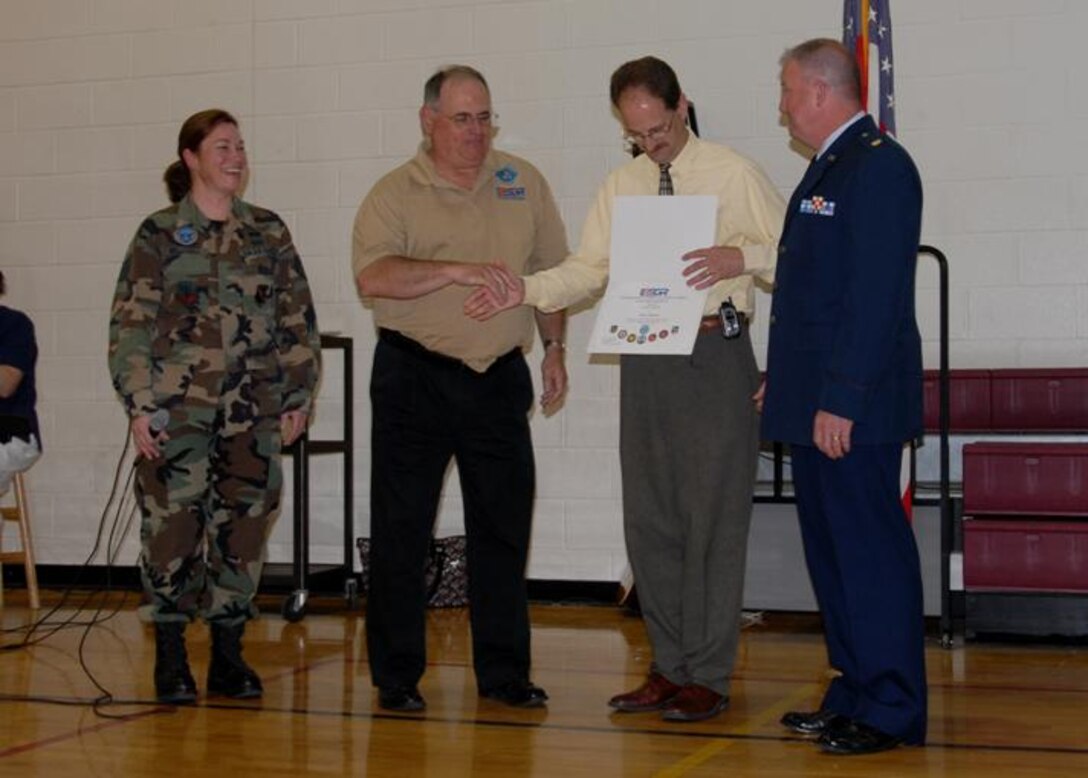 Staff Sgt Karla Belliveau, Mr. Earl Bonett (Western MA ESGR Chair), and Maj. Steve Dougherty (104 FW Civil Engineering Commander), present Ms. Sue Frederick and Mr. Richard Bedard the ESGR recognition awards during the school’s Memorial Day ceremony. (photos by Capt. Matthew T. Mutti)
