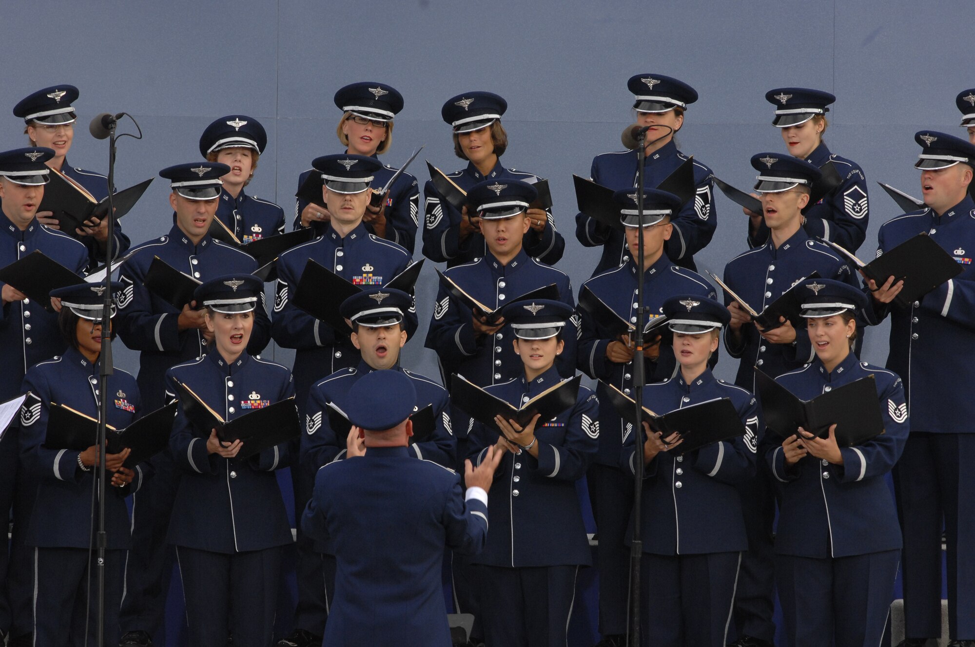Sept. 11, 2008:  Colonel Layendecker conducts the Singing Sergeants at the Dedication Ceremony of the Pentagon 9/11 Memorial. (USAF photo by Andy Morateya)