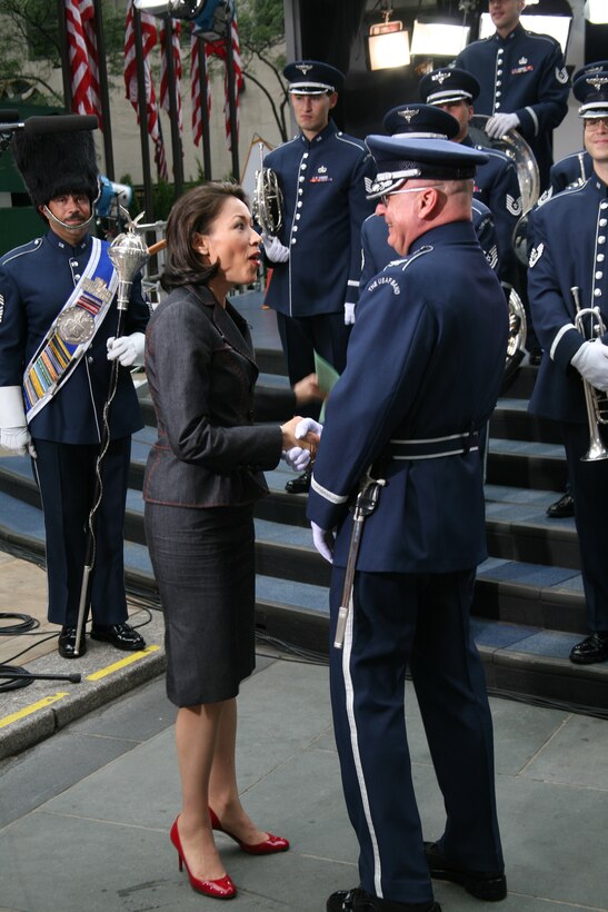 July 4, 2006:  Colonel Layendecker is greeted by news anchor, Anne Curry, during a performance by the USAF Ceremonial Brass on NBC’s “Today” Show.  The Ceremonial Brass has been featured on Today’s Independence Day broadcast for the past 10 years.  (USAF photo)
