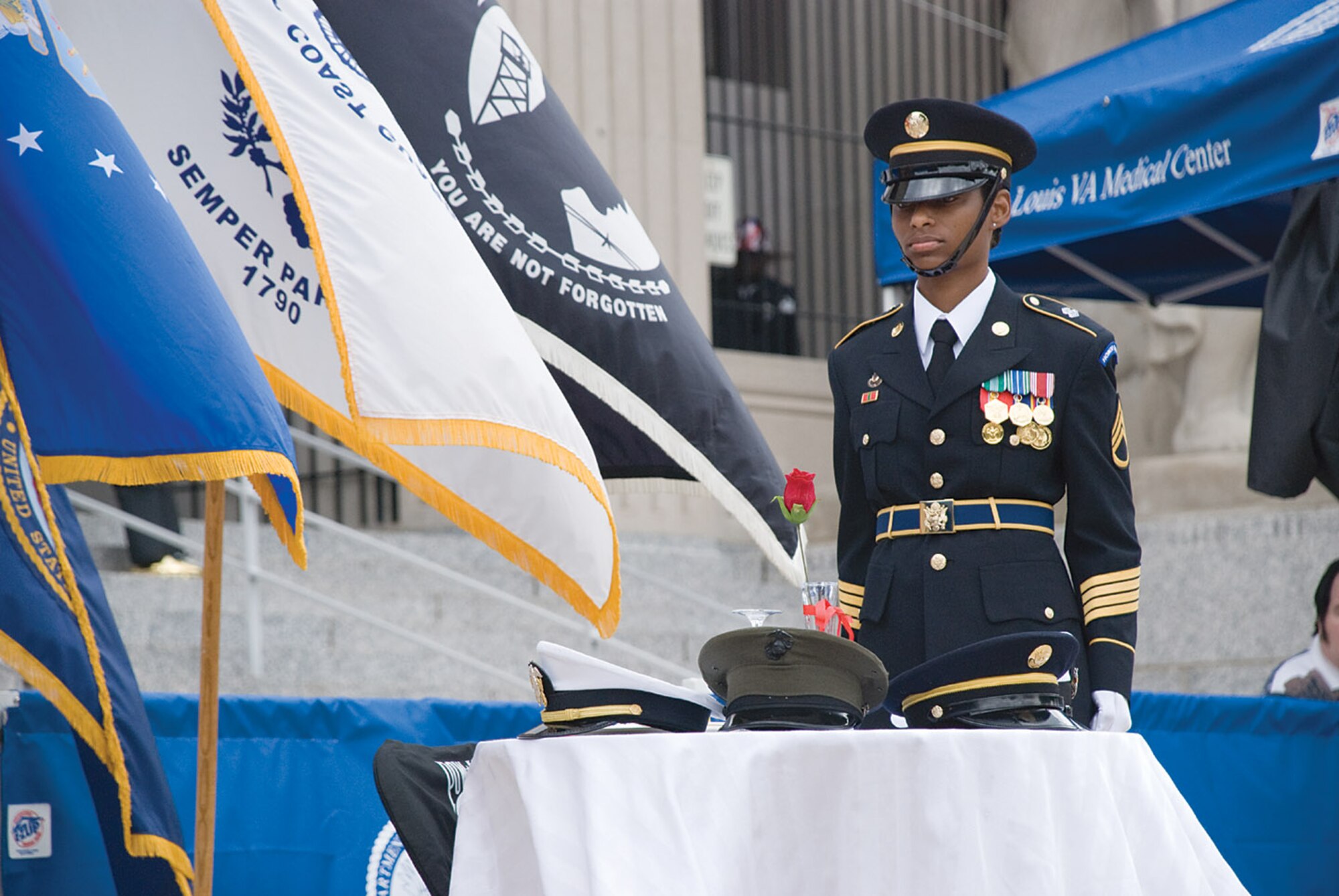 SCOTT AIR FORCE BASE, Ill. -- Army Staff Sgt. Shelondria Henry, Army Human Resources Command Honor Guard, performs a symbolic Prisoner of War/Missing in Action Ceremony Saturday at Soldiers’ Memorial in downtown St. Louis as part of a Welcome Home Celebration for area veterans. (U.S. Air Force photo/Steven Berry)