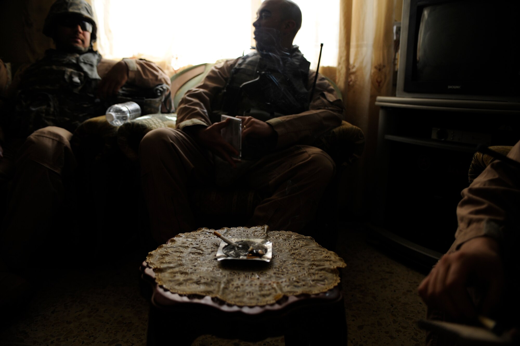 U.S. Air Force Airmen of the 732nd Expeditionary Security Forces Squadron Det. 3 meet with the Commander of an Iraqi Police Station May 12, 2009, in Baghdad. (U.S. Air Force Photo by Staff Sgt. Shawn Weismiller)