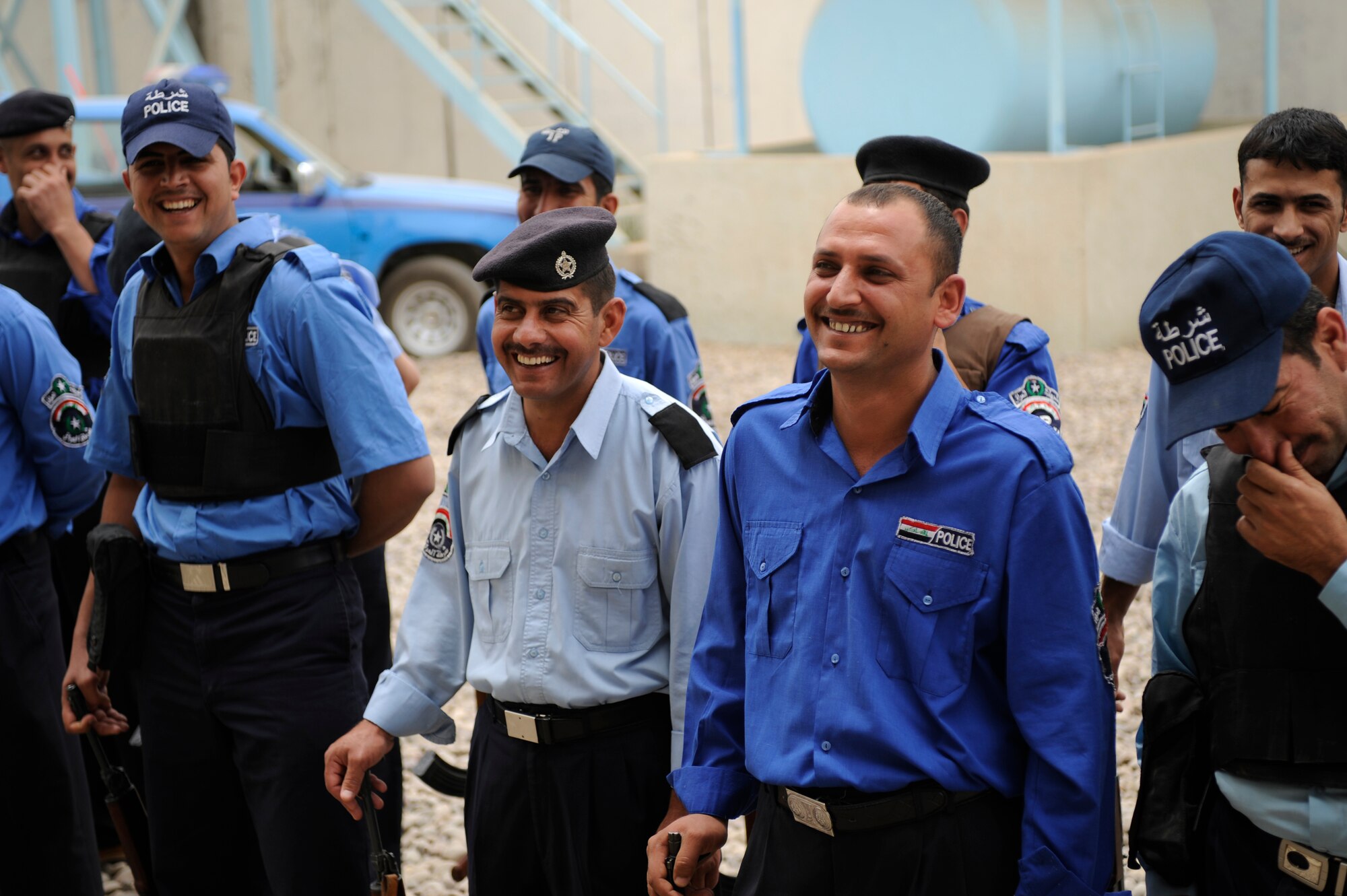 Iraqi Policemen stand in formation as U.S. Air Force Airmen of the 732nd Expeditionary Security Forces Squadron Det. 3 conduct a training session May 10, 2009, in Baghdad. U.S. Air Force Security Forces Airmen are assigned to Forward Operating Base Falcon to train local Iraqi Police. These Airmen are responsible for numerous Iraqi Police Stations within Southern Baghdad. Detachment 3 is made up of Airmen from over fifty bases throughout the United States, Europe and Asia.   (U.S. Air Force Photo by Staff Sgt. Shawn Weismiller)