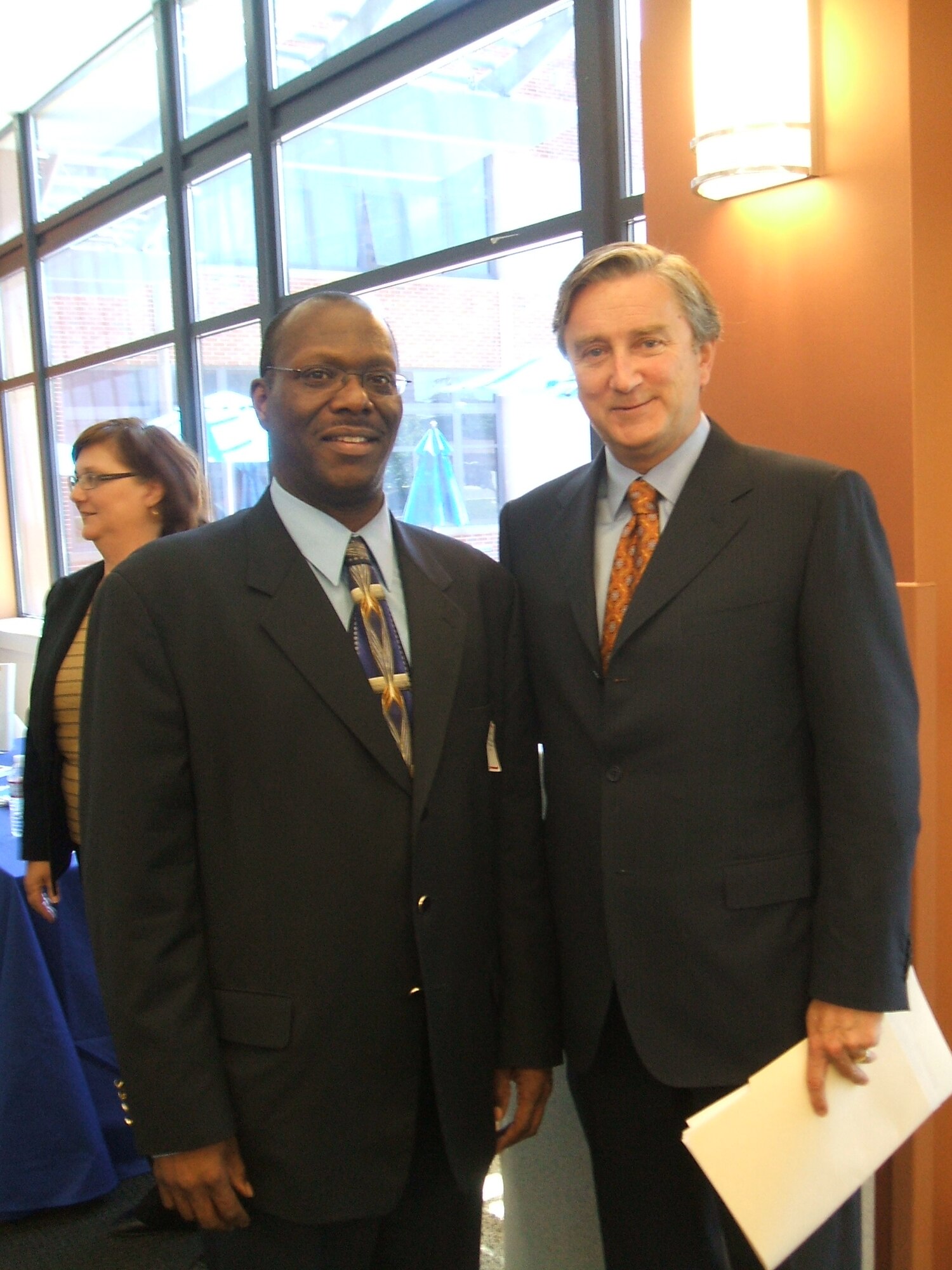 Jerrell Riggins of Electronic Systems Center's Small Business Office meets with 
U.S. Rep. John F. Tierney (Mass. 6th Congressional District) during the 'Doing Business with the Federal Government' workshop June 1 at Salem State College, Salem, Mass.  More than 250 people attended the workshop.