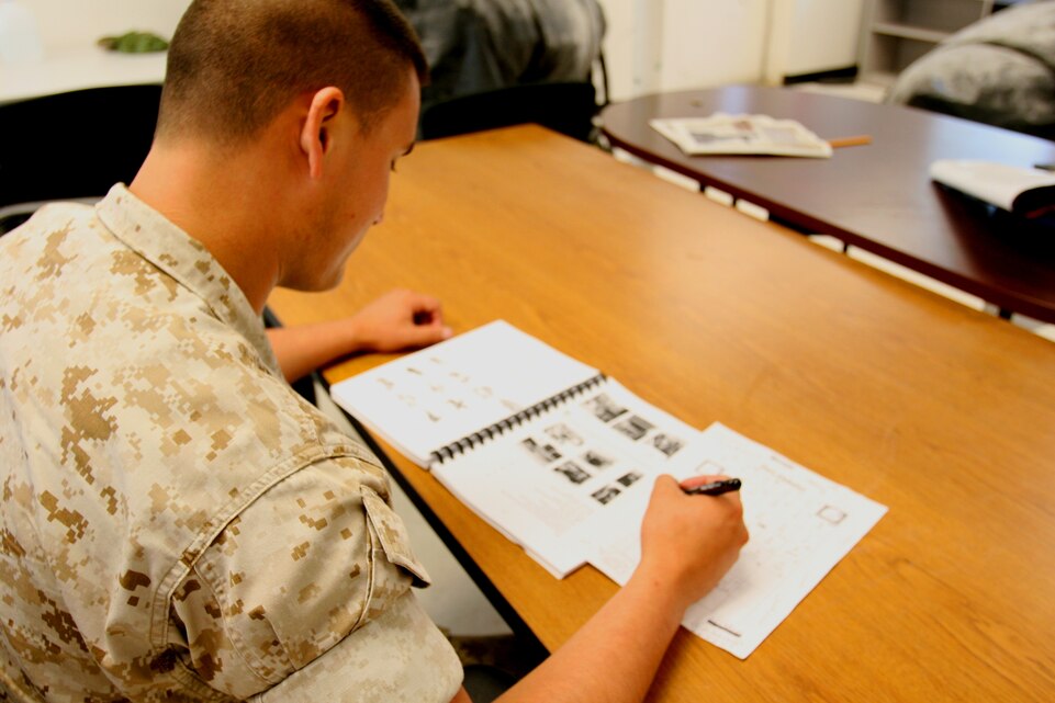 MARINE CORPS BASE CAMP LEJEUNE, N.C. – A Marine with a company from 2d Marine Special Operations Battalion, U.S. Marine Corps Forces, Special Operations Command studies Dari, the most widely spoken language in Afghanistan. Marines and Sailors are participating in language and culture training here in preparation for their upcoming deployment to Afghanistan.