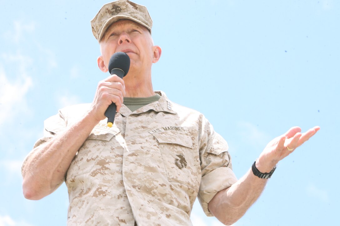 MARINE CORPS BASE, CAMP PENDLETON, Calif., (June 5, 2009) -- The Commandant of the Marine Corps, Gen. James T. Conway, addresses the Marines and sailors of Camp Pendleton at the mainside football field, June 5.::r::::n::General Conway addressed concerns about continuing operations in Iraq and Afghanistan, highlighting the operational shift in the Central Command area of operations. While advisory groups will continue training the fledgling Iraqi Marine Corps, most Marine Corps efforts will be aimed at Afghanistan in the near future, Conway said.::r::::n::Conway's senior enlisted advisor, Sgt. Maj. Carlton W. Kent, called on Marine noncommissioned officers to listen and take action regarding their junior Marines, citing an unacceptable number of suicides in recent years.