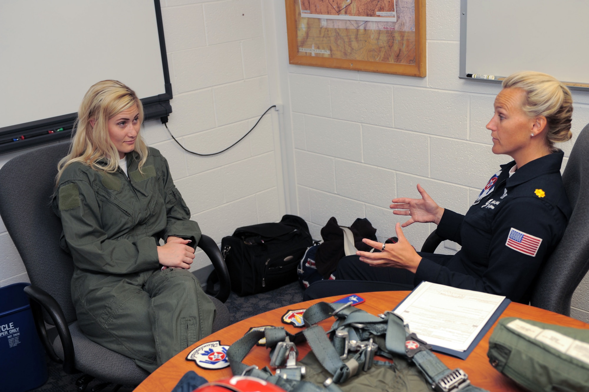 Megan Funk, a second grade teacher at Majestic Elementary School in Ogden, Utah, receives a medical screening June 4 from Maj. Charla Quayle, Air Force Thunderbird flight surgeon.  Mrs. Funk received more than three hours of screening, training and briefings at Hill Air Force Base, Utah, before her Hometown Hero flight in a Thunderbird F-16 Fighting Falcon.  (U.S Air Force photo/Tech. Sgt. Russ Martin)