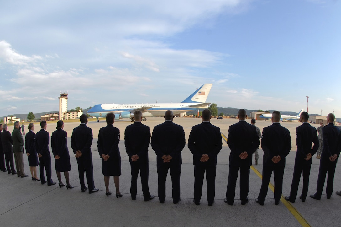 Airmen at Ramstein Air Base, Germany, stand at parade rest June 5 as Air Force One prepares to take off. President Barack Obama had stopped at Ramstein en route to nearby Landstuhl Regional Medical Center to visit wounded U.S. servicemembers being treated there. (U.S. Air Force photo/Senior Airmen Kenny Holston)