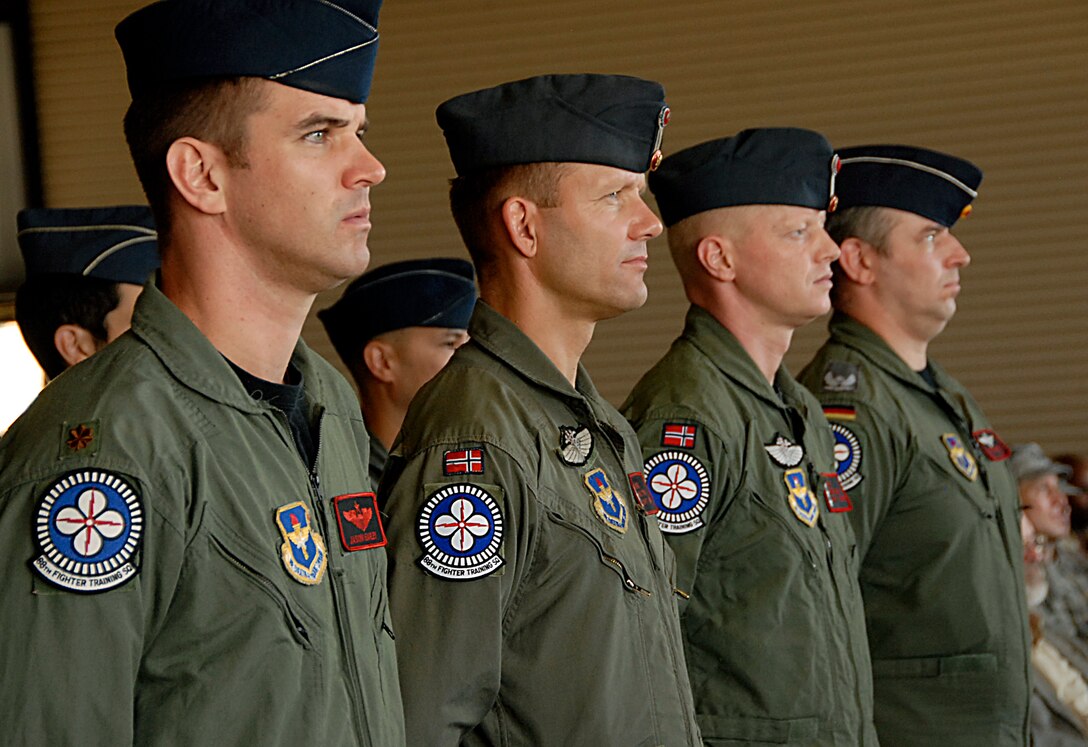 Members of the 88th Flying Training Squadron participate in the change of command ceremony as Lt. Col. James Robinson takes command of the squadron June 4. (U.S. Air Force photo/Harry Tonemah) 