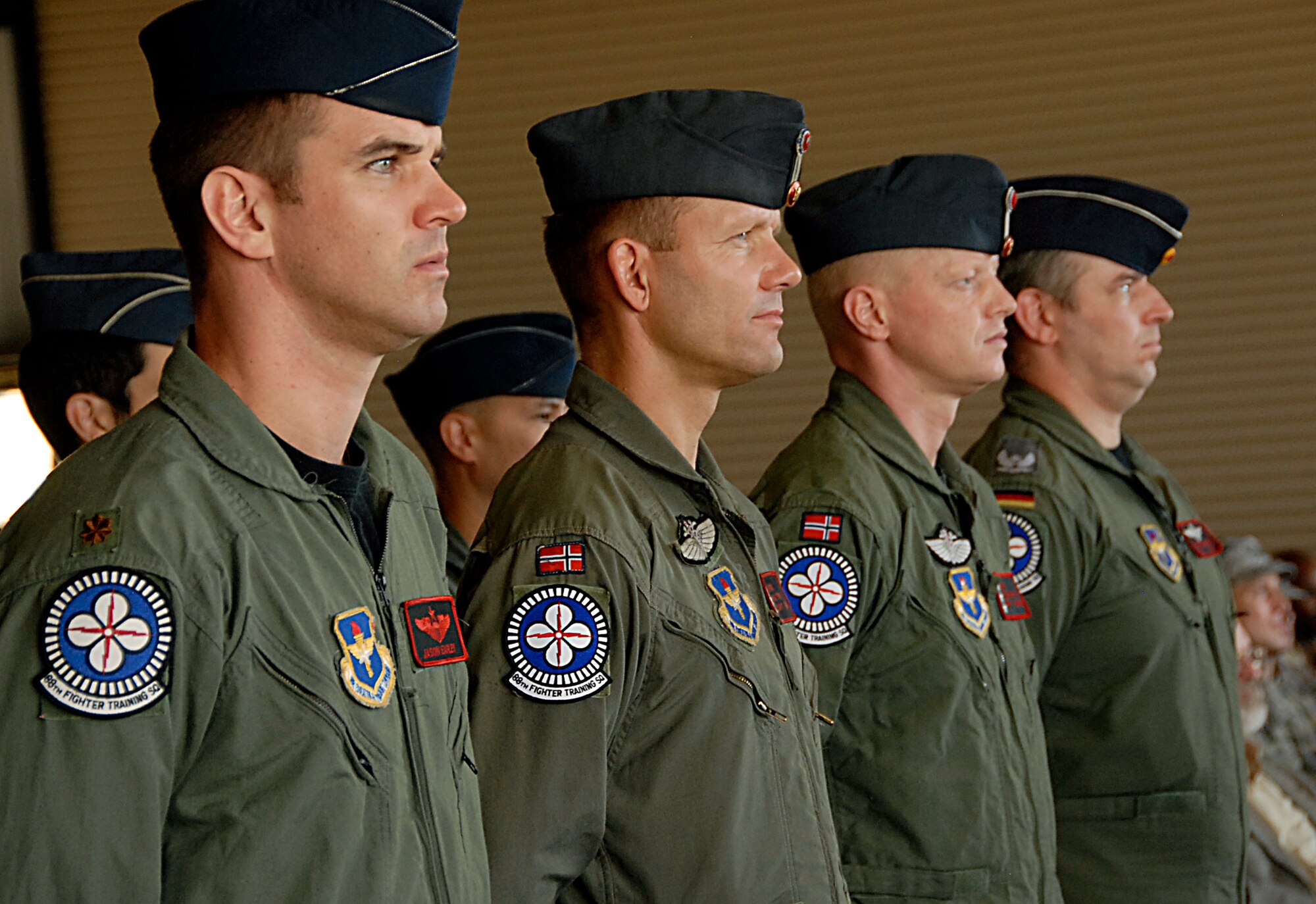 Members of the 88th Flying Training Squadron participate in the change of command ceremony as Lt. Col. James Robinson takes command of the squadron June 4. (U.S. Air Force photo/Harry Tonemah) 
