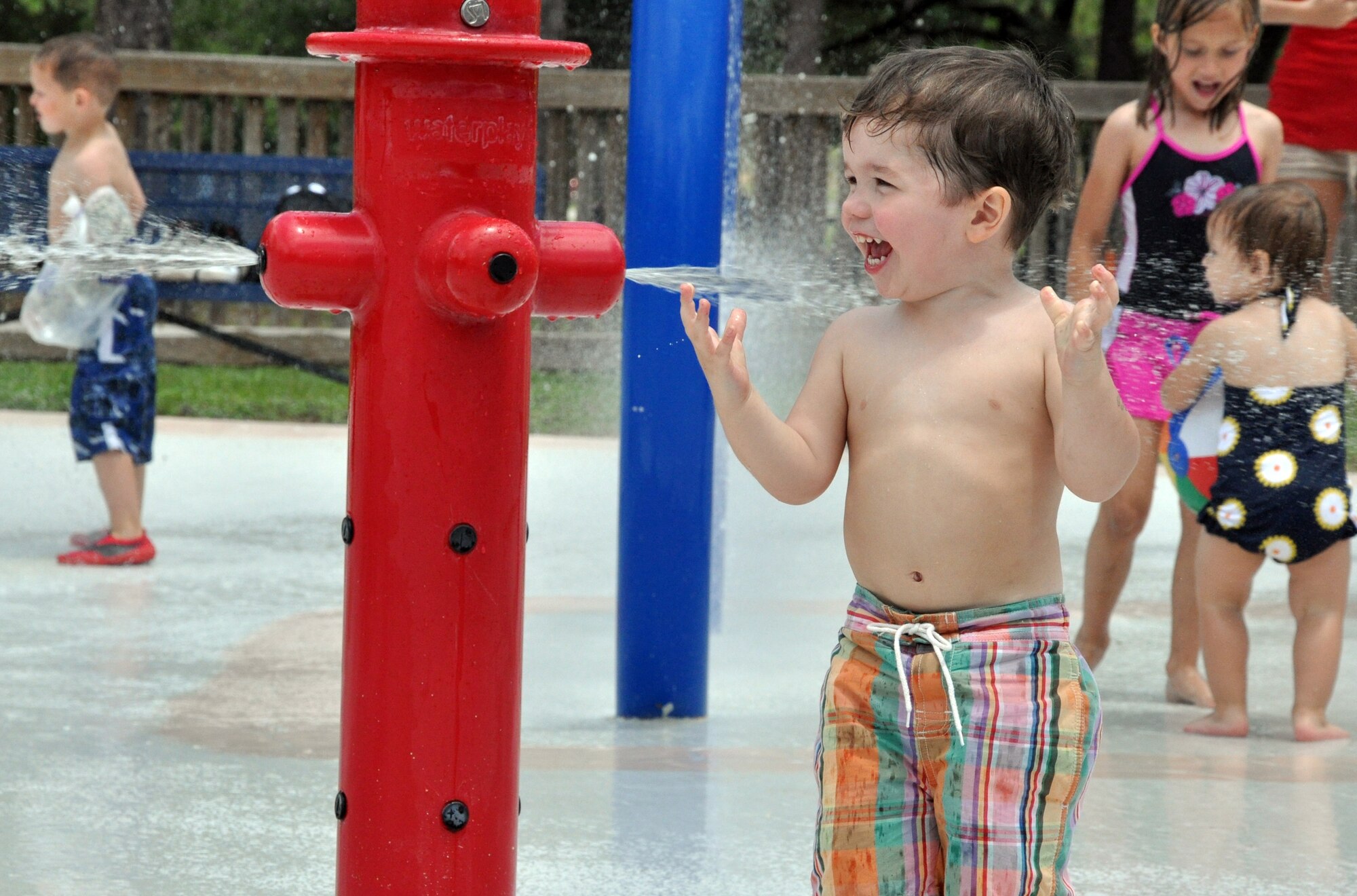EGLIN AIR FORCE BASE, Fla. – Children play in the water during the base community picnic June 5. (U.S. Air Force photo/ Airman Anthony Jennings)
