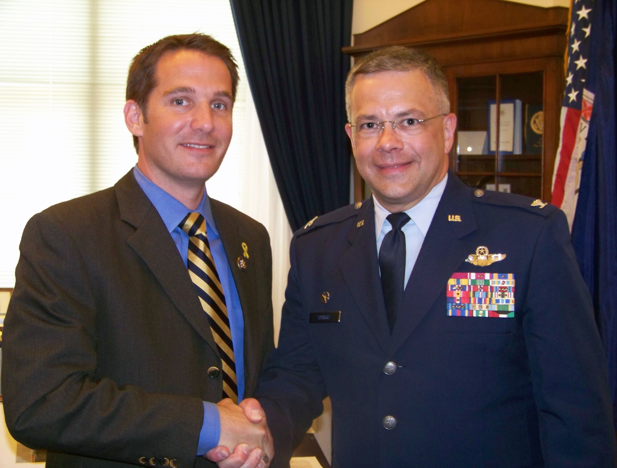 Col. Randal L. Bright, 512th Airlift Wing commander, met with U.S. Congressman Glenn Nye for Virginia's second district June 3 at the U.S. Capitol in Washington D.C. Of the 512th Airlift Wing's 1,800 members, almost 300 of those members reside in Virginia. During his trip to D.C., the colonel also visited the offices of Delaware's U.S Senators Thomas Carper and Edward E. "Ted" Kaufman, Delaware U.S. Congressman Mike Castle and Maryland U.S. Congressman Steny H. Hoyer. (U.S. Air Force photo/Capt. Marnee A.C. Losurdo)
