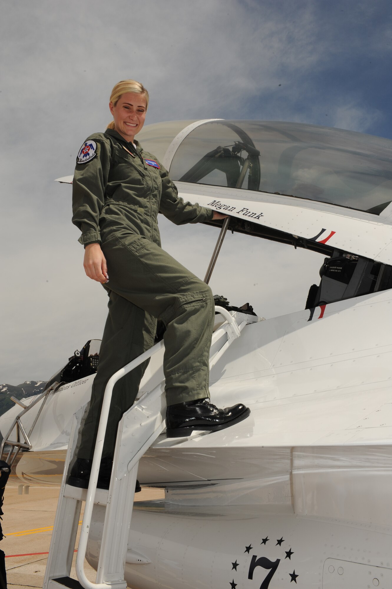 Megan Funk poses before her Hometown hero flight in a Thunderbird F-16 Fighting Falcon June 4 at Hill Air Force Base, Utah. (U.S Air Force photo by Tech. Sgt. Russ Martin)